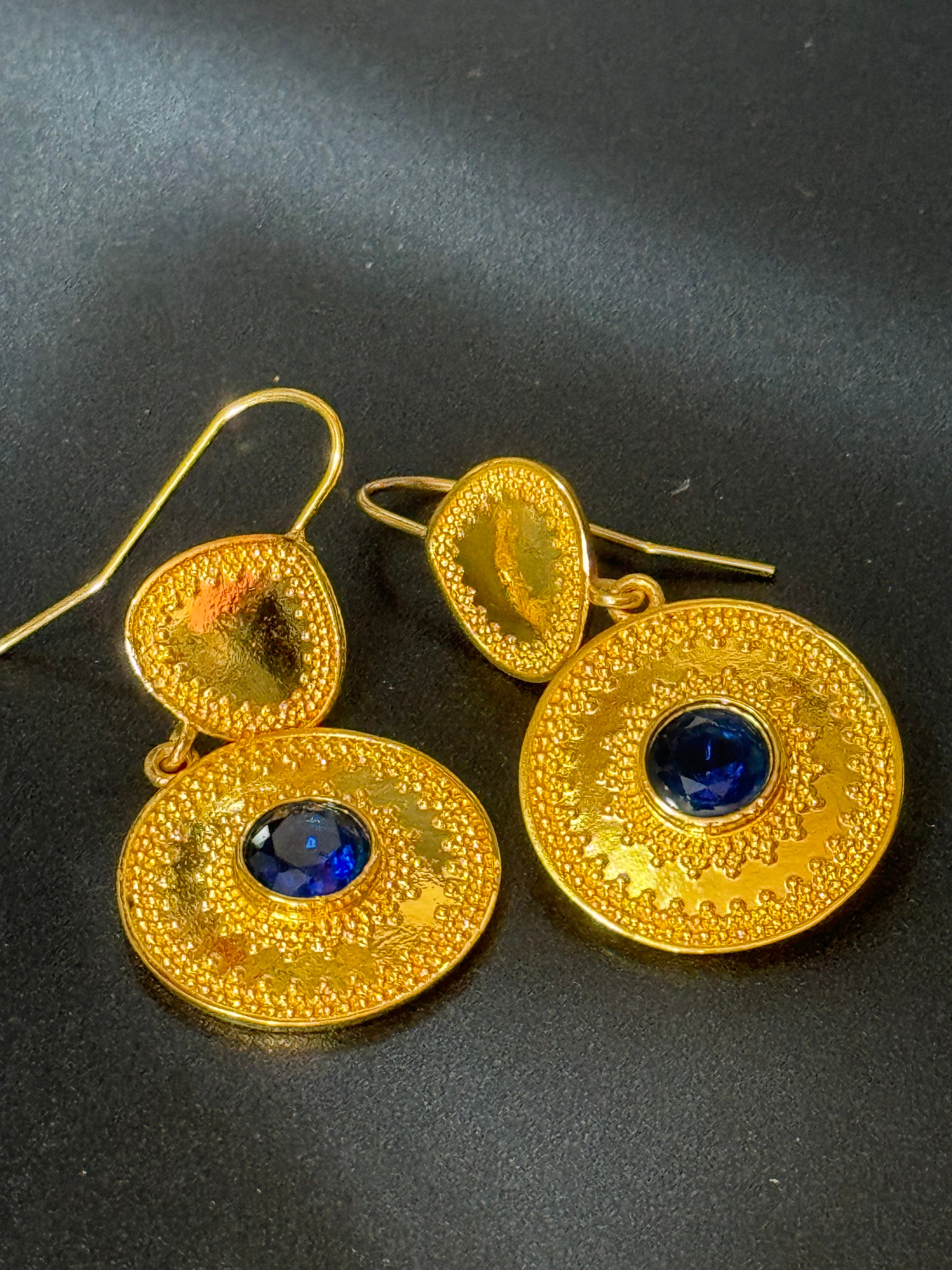 Etruscan gold tone sapphire blue diamanté disc pierced drop earrings