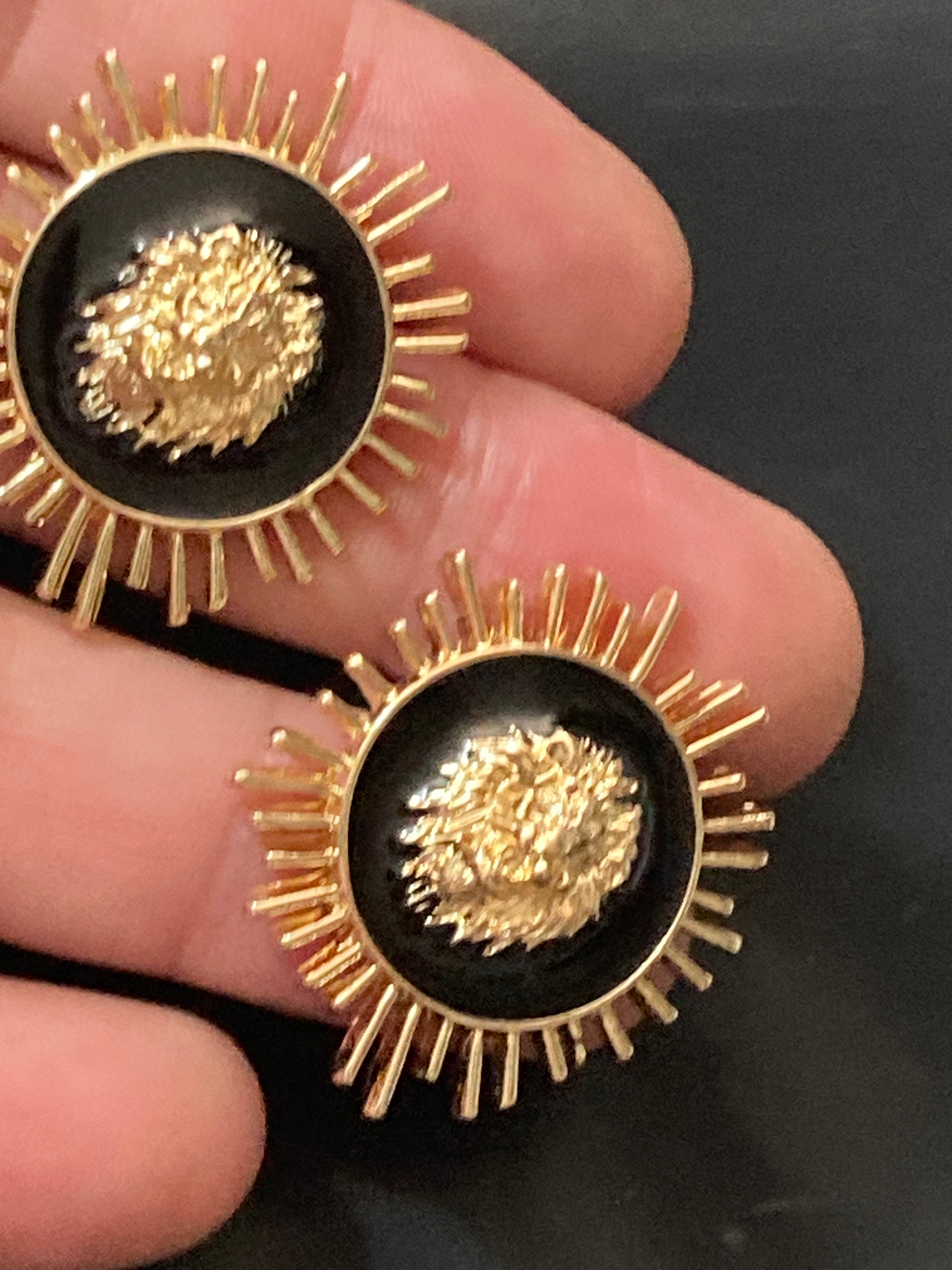 Oversized black and gold lions head spiky stud earrings pierced