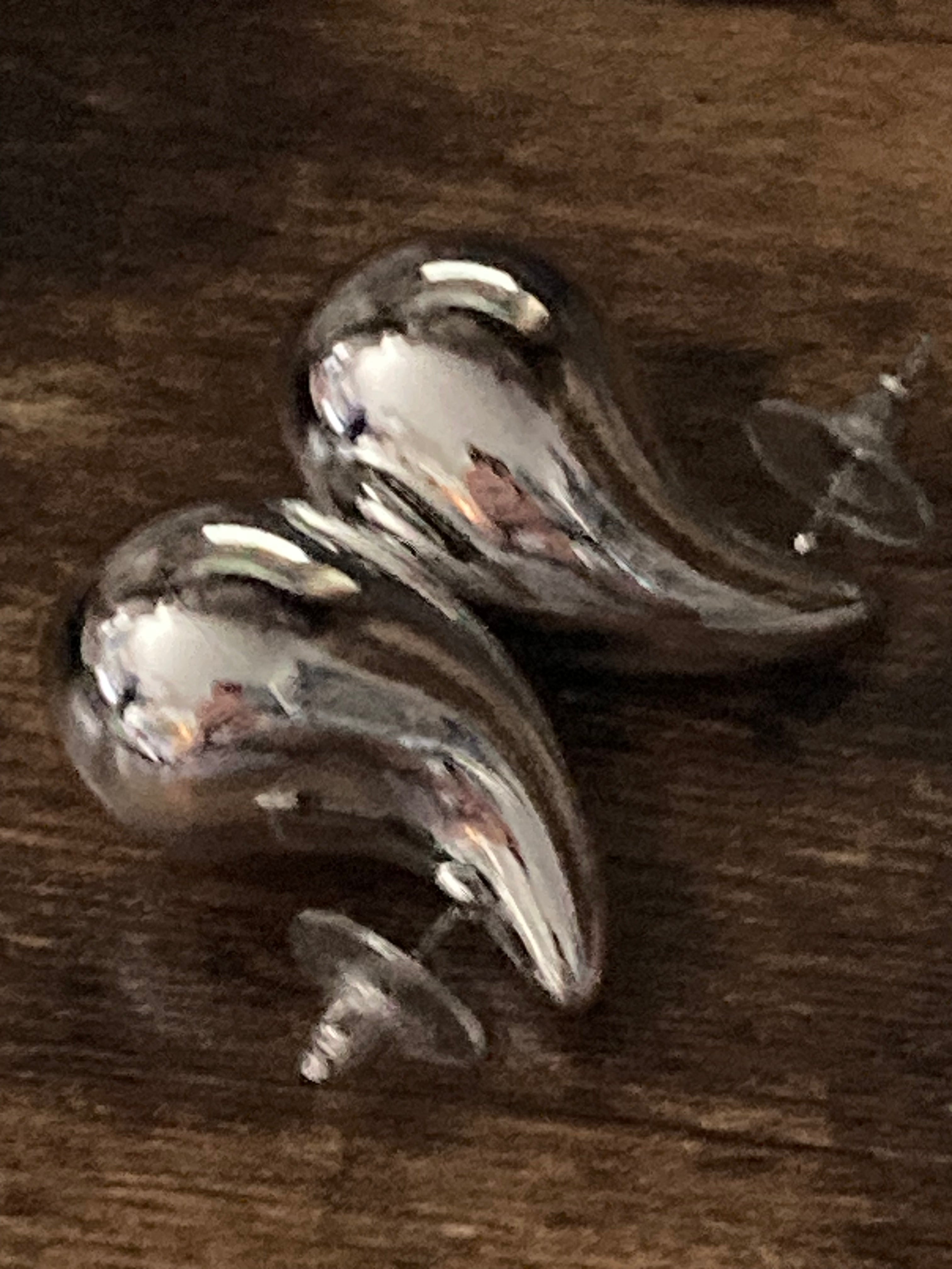 Silver tone oversized high sheen dome earrings comma  teardrop shaped