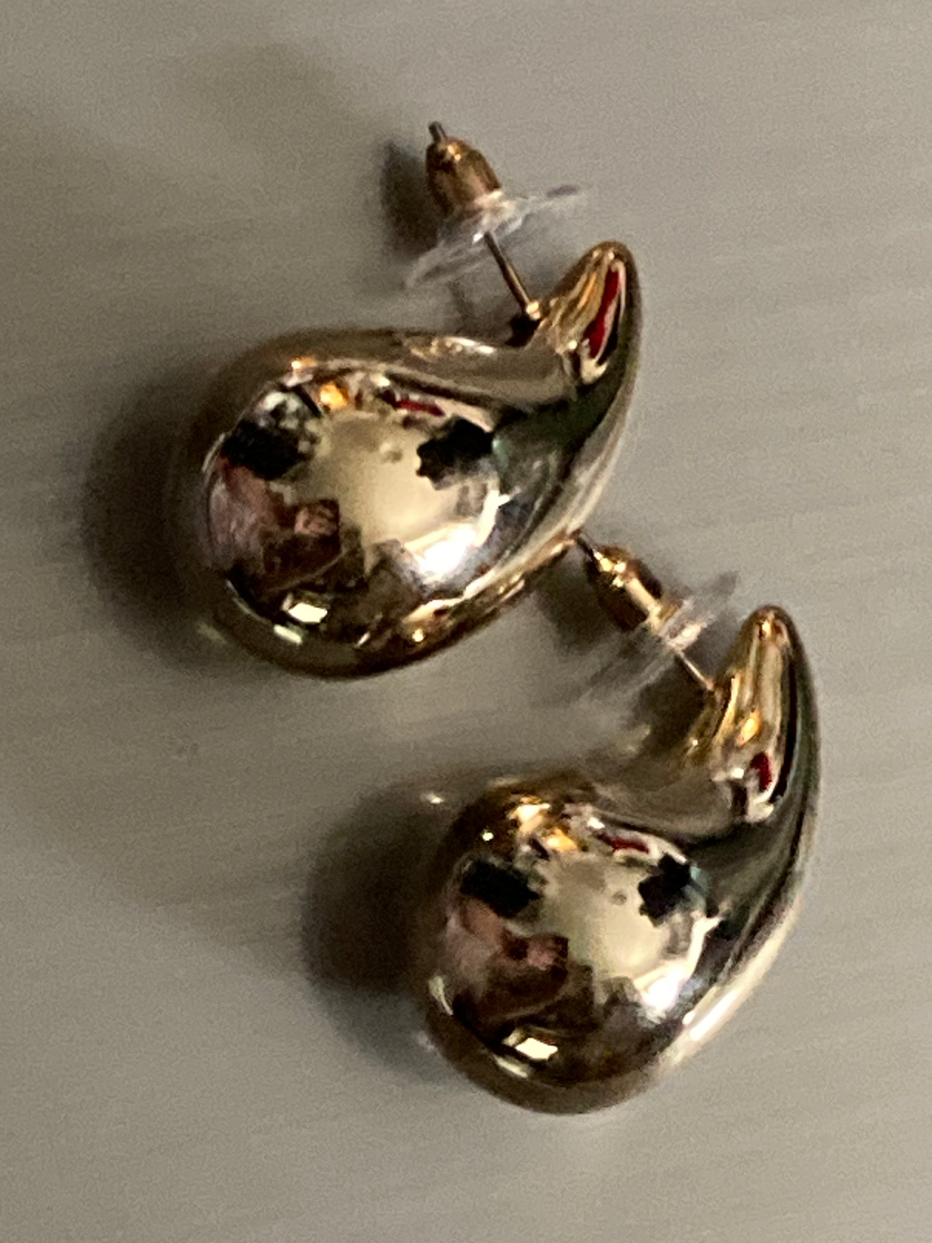 Gold oversized high sheen dome earrings comma teardrop shaped