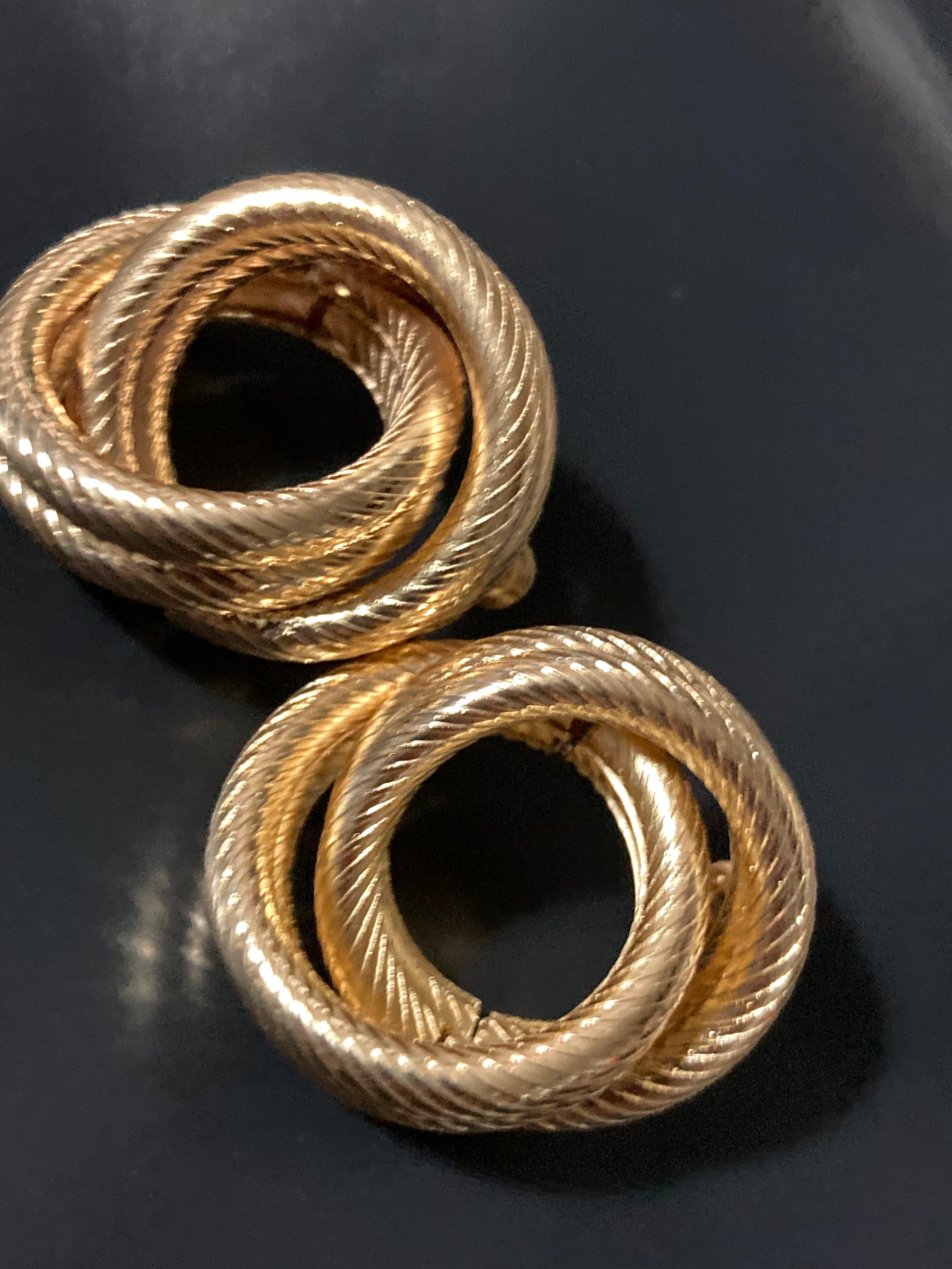 Oversized rope textured Gold tone oval tube knot earrings