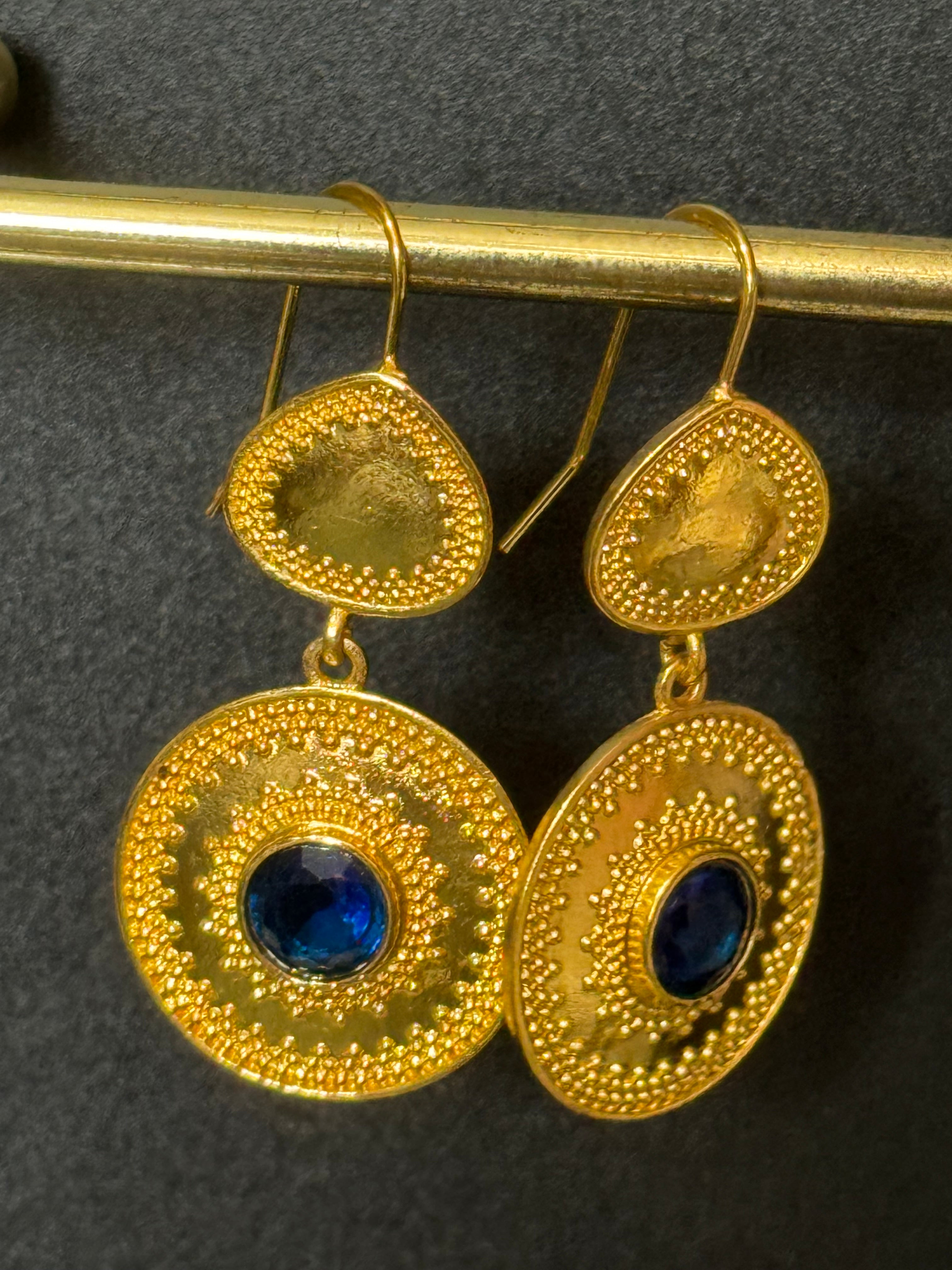 Etruscan gold tone sapphire blue diamanté disc pierced drop earrings