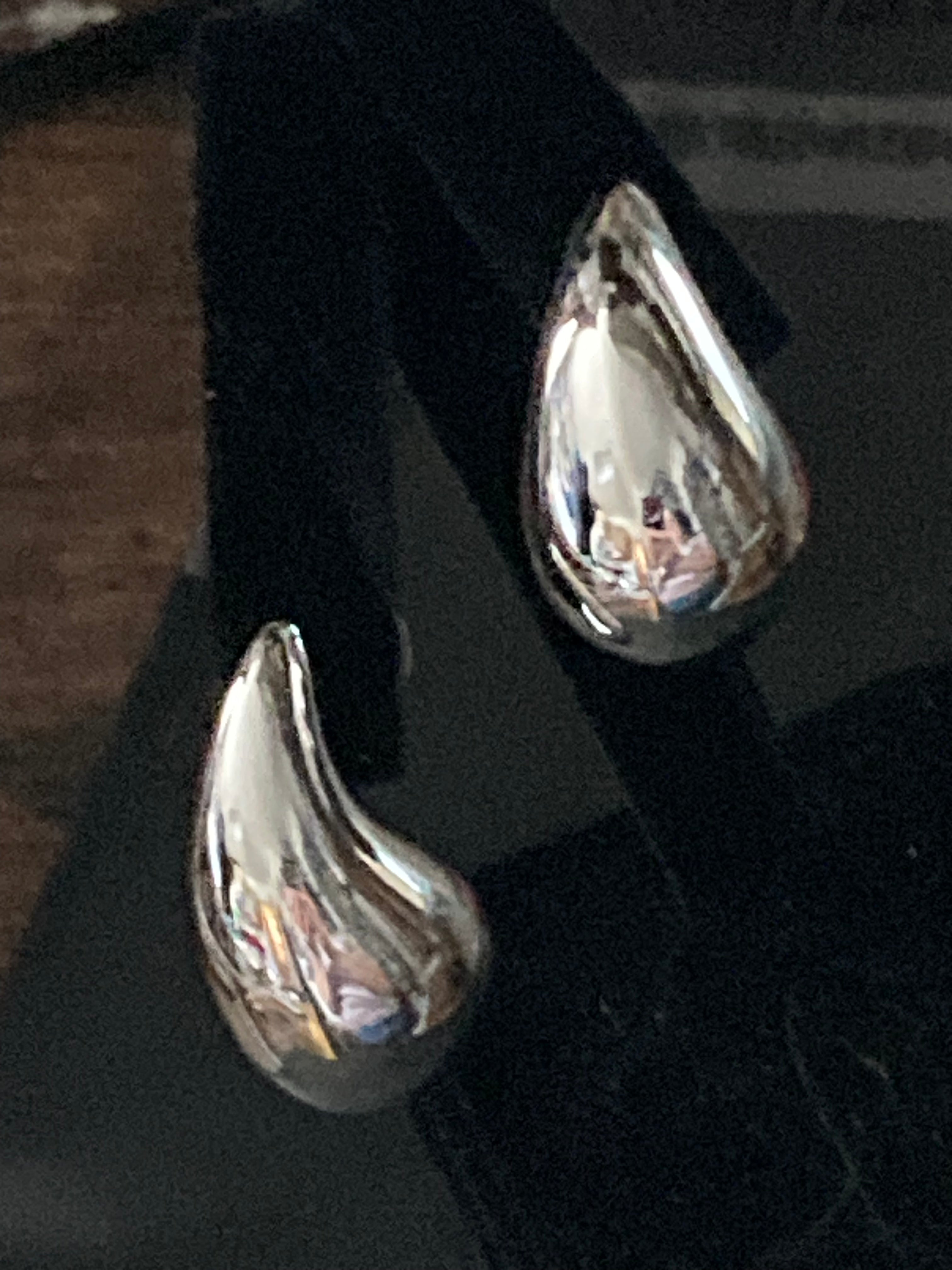 Silver tone oversized high sheen dome earrings comma  teardrop shaped