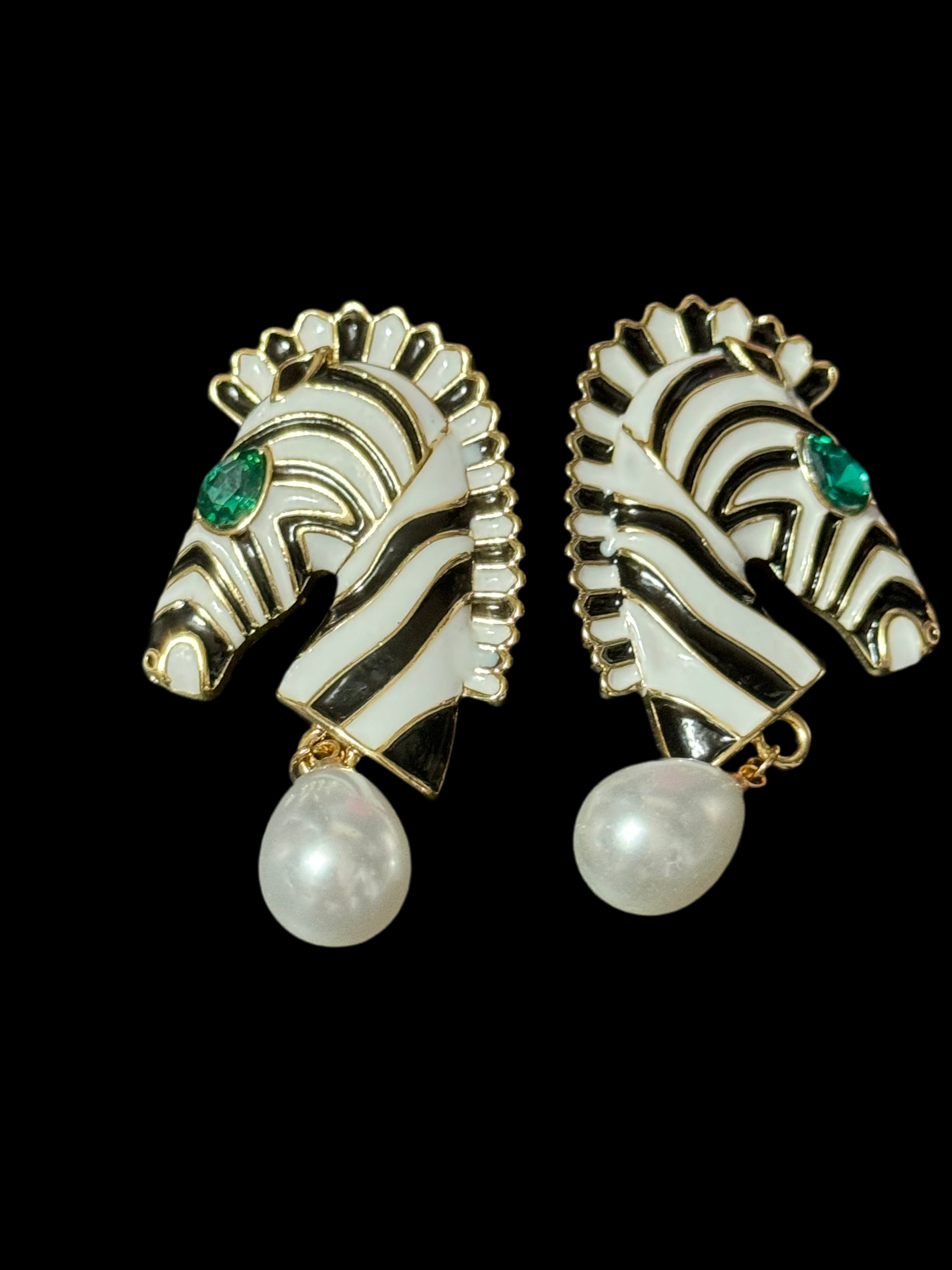 Gold tone zebra pearl drop earrings