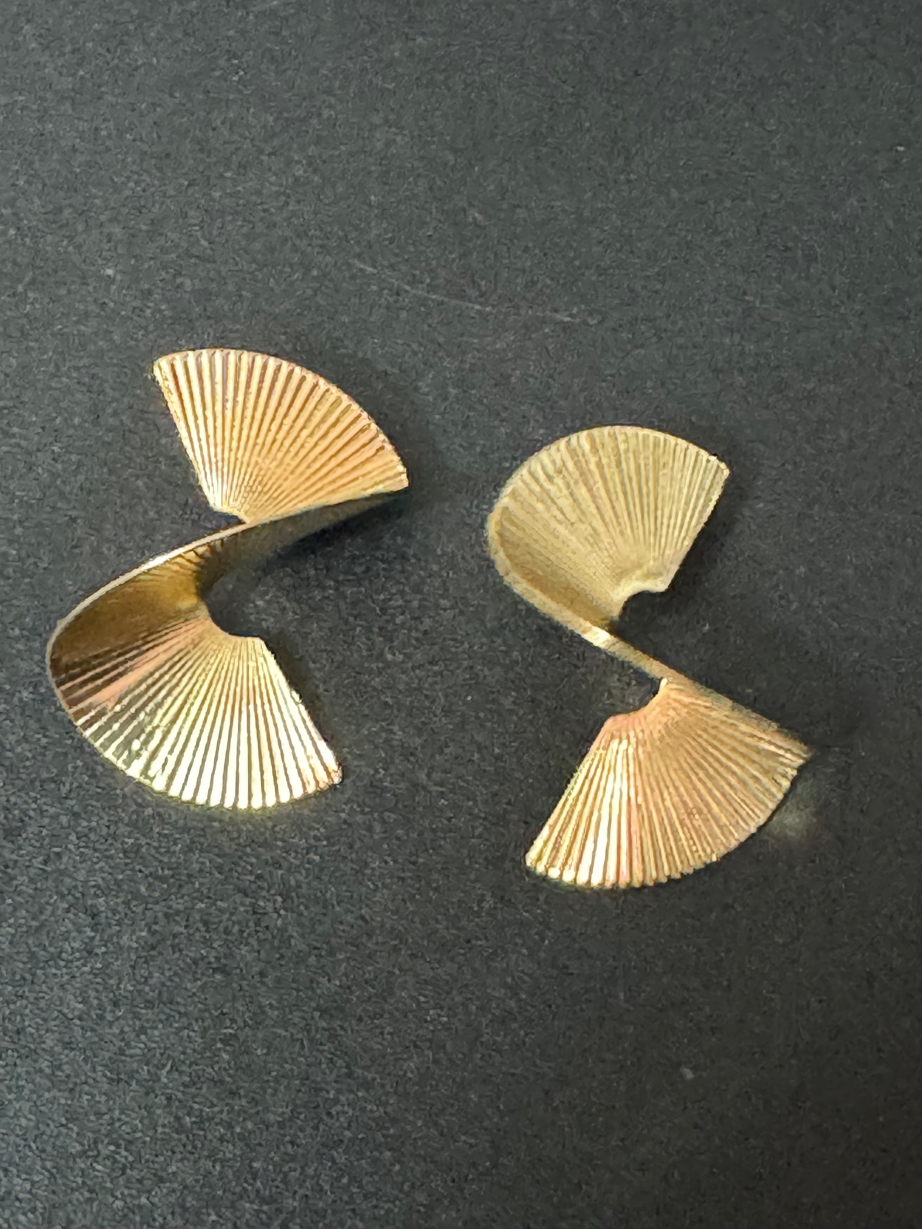 Oversized twisted abstract fan earrings gold tone