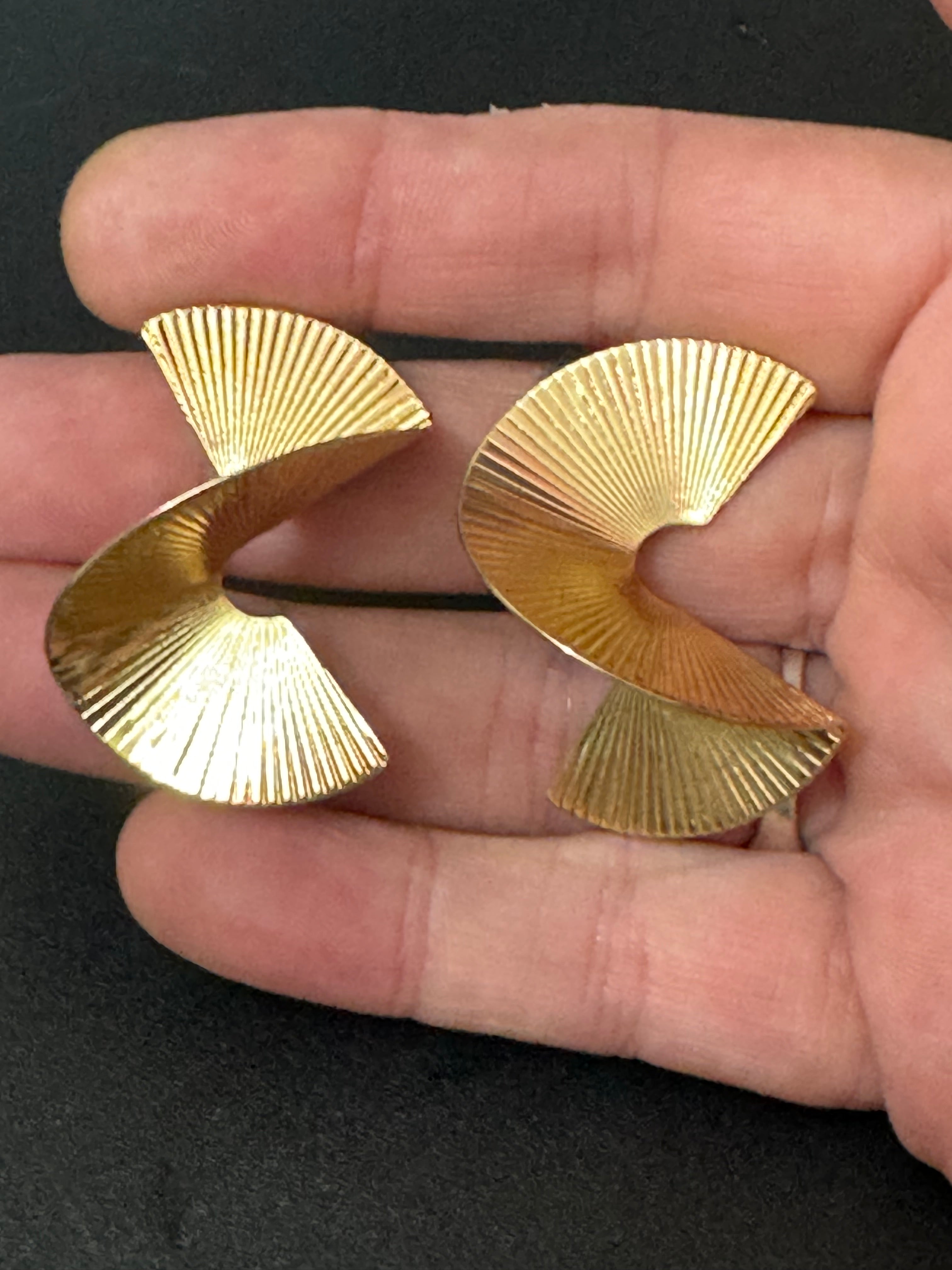 Oversized twisted abstract fan earrings gold tone