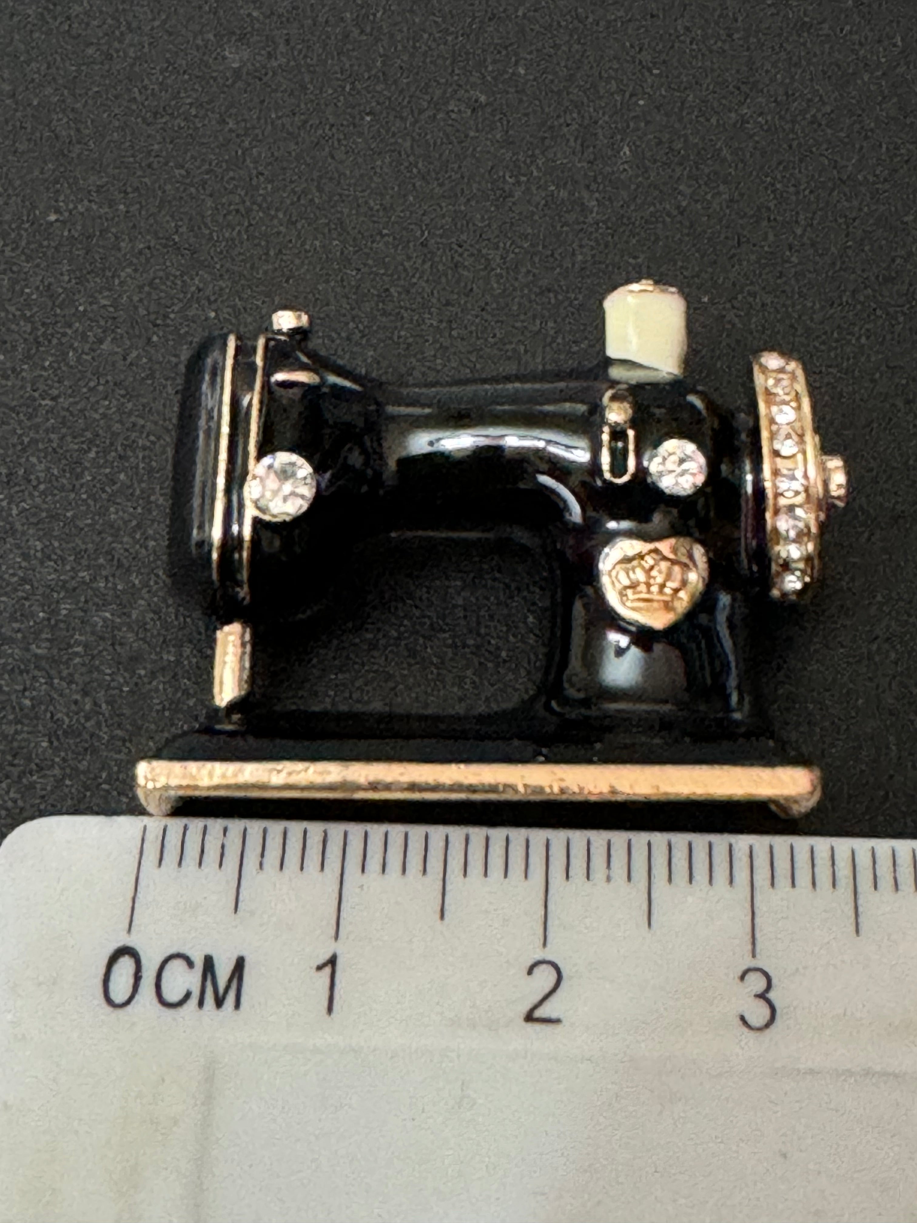 Vintage style sewing machine brooch black , gold tone enamel with crystals