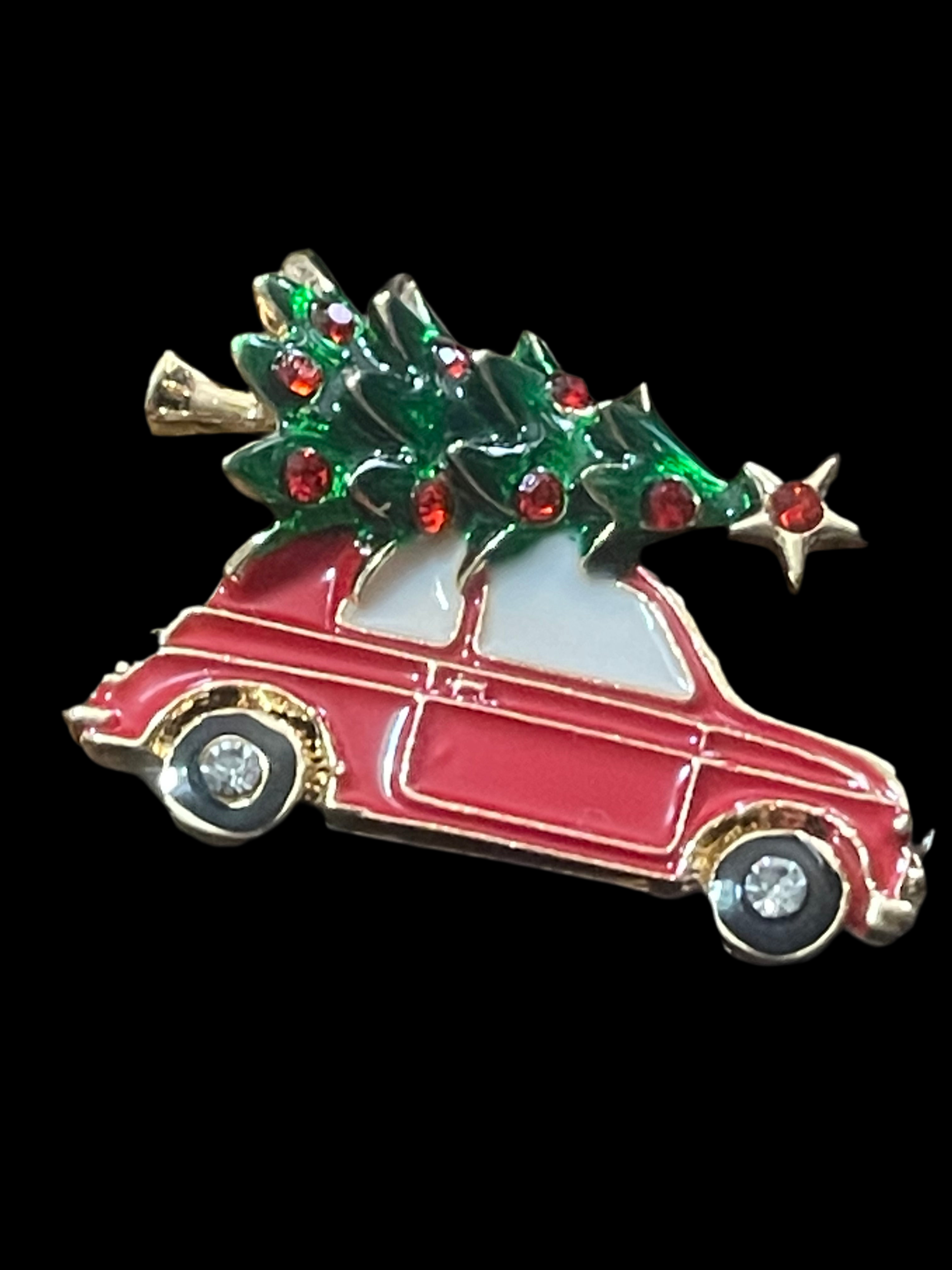 Driving home for Christmas tree and car brooch