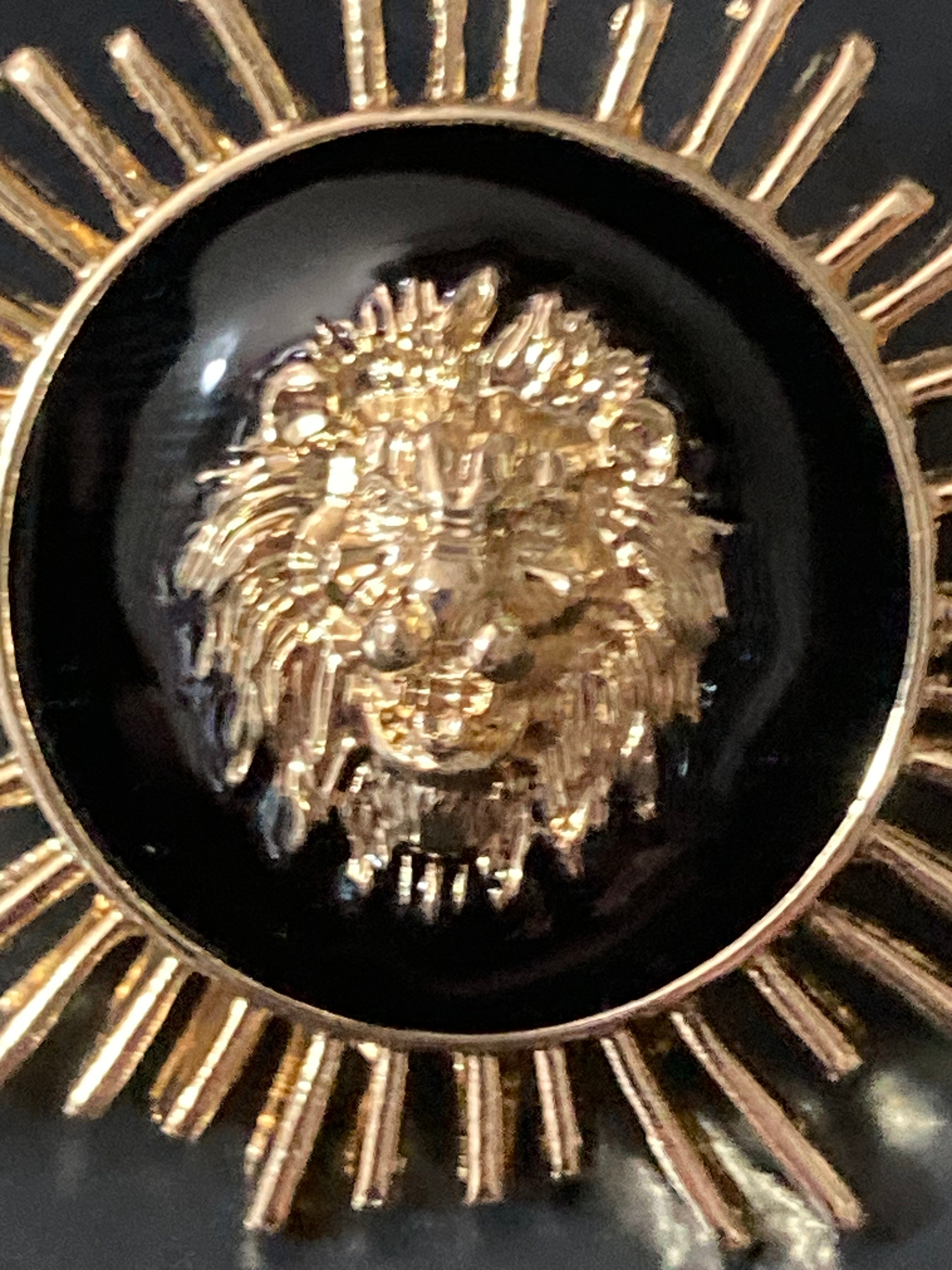 Oversized black and gold lions head spiky stud earrings pierced