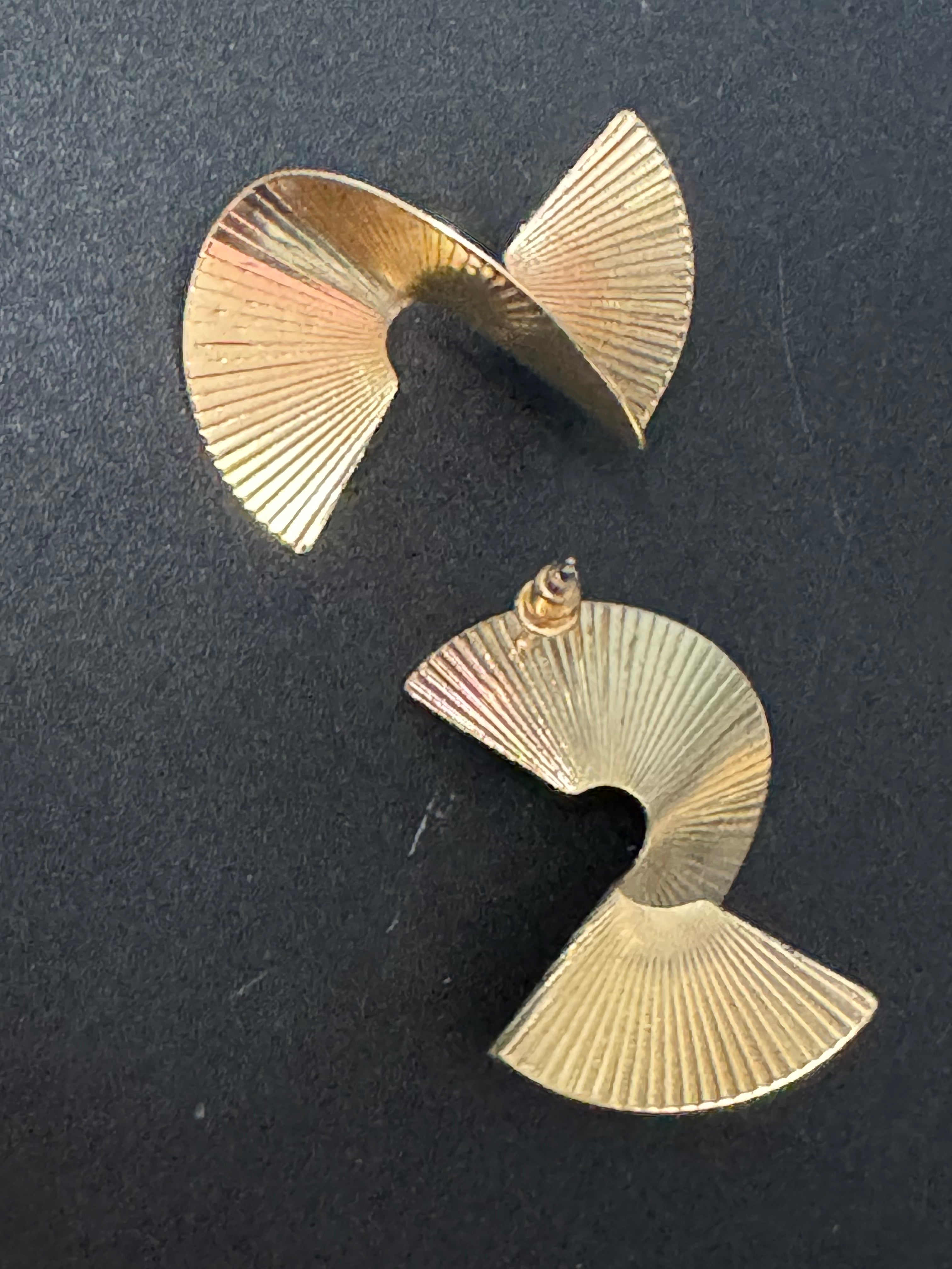 Oversized twisted abstract fan earrings gold tone