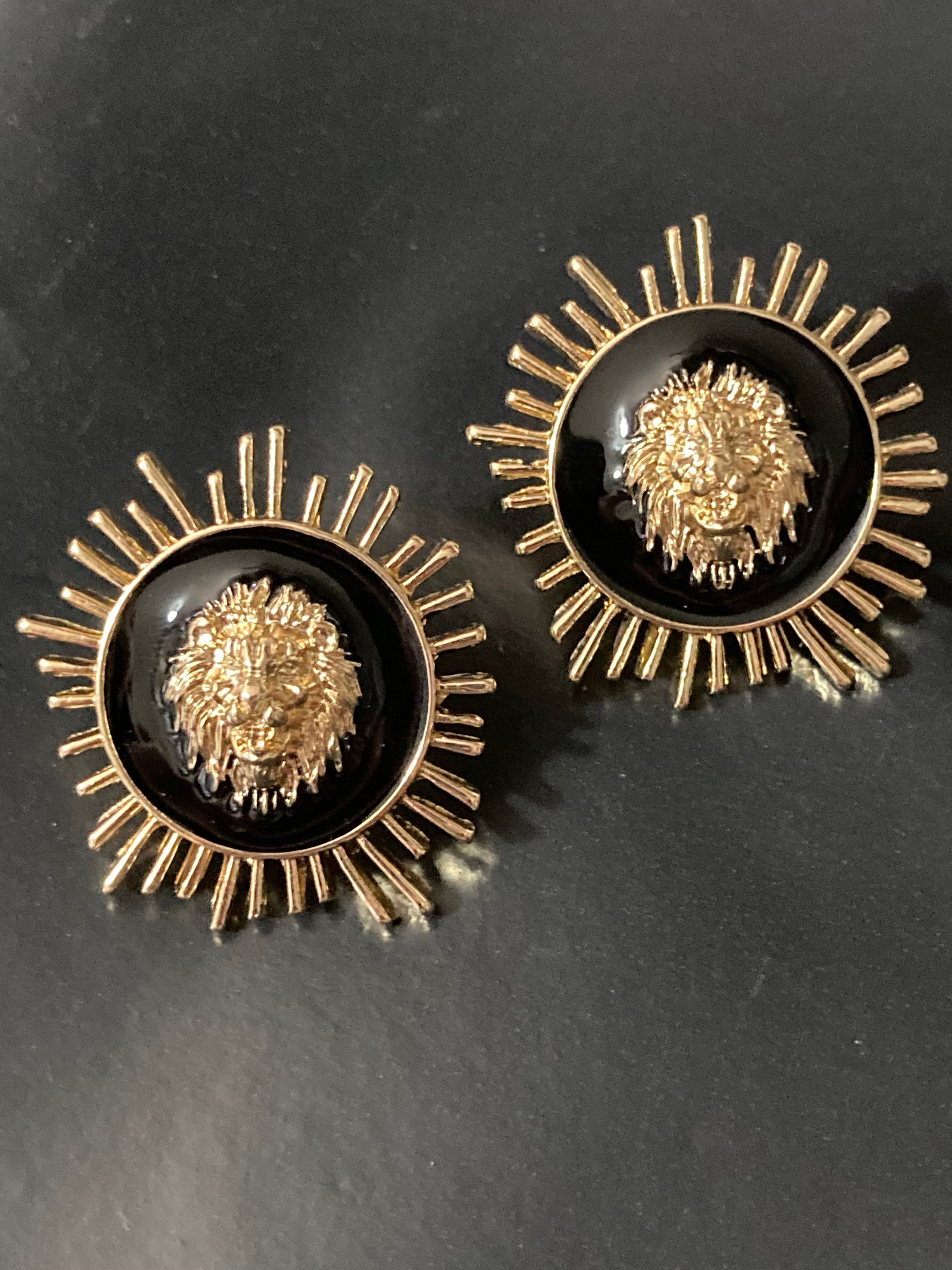 Oversized black and gold lions head spiky stud earrings pierced