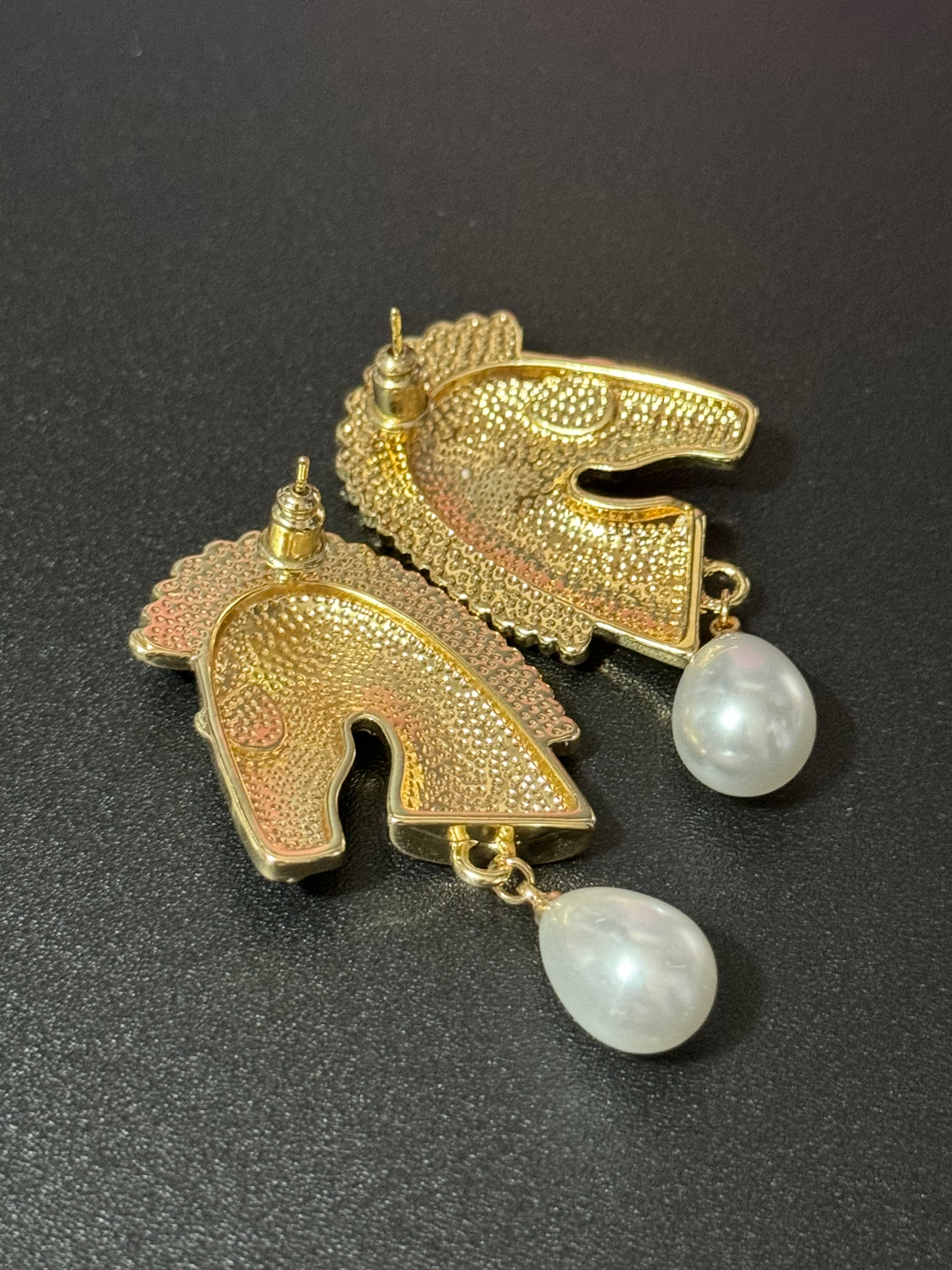 Gold tone zebra pearl drop earrings