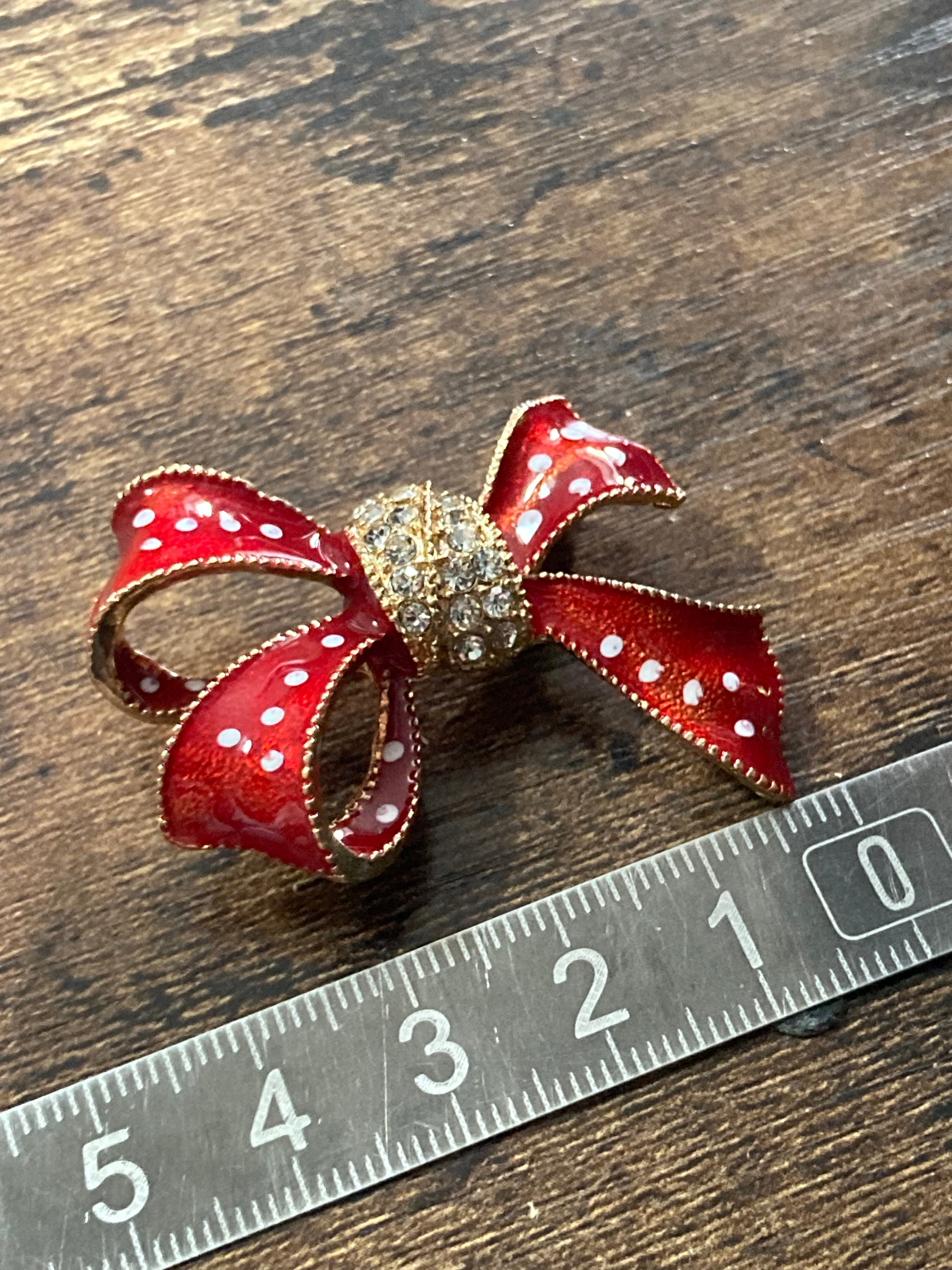 Cure red and white polka dot diamanté bow brooch