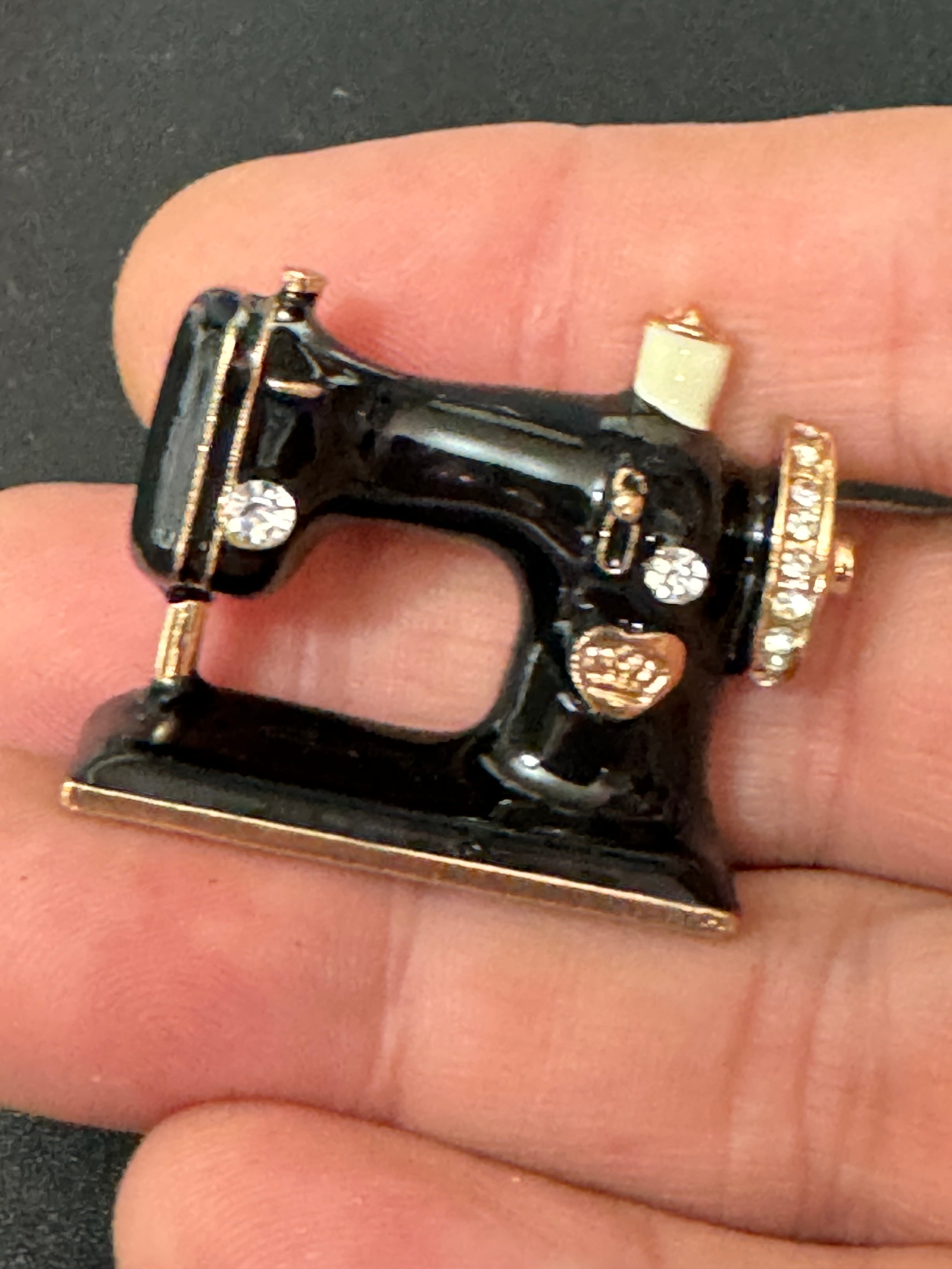 Vintage style sewing machine brooch black , gold tone enamel with crystals