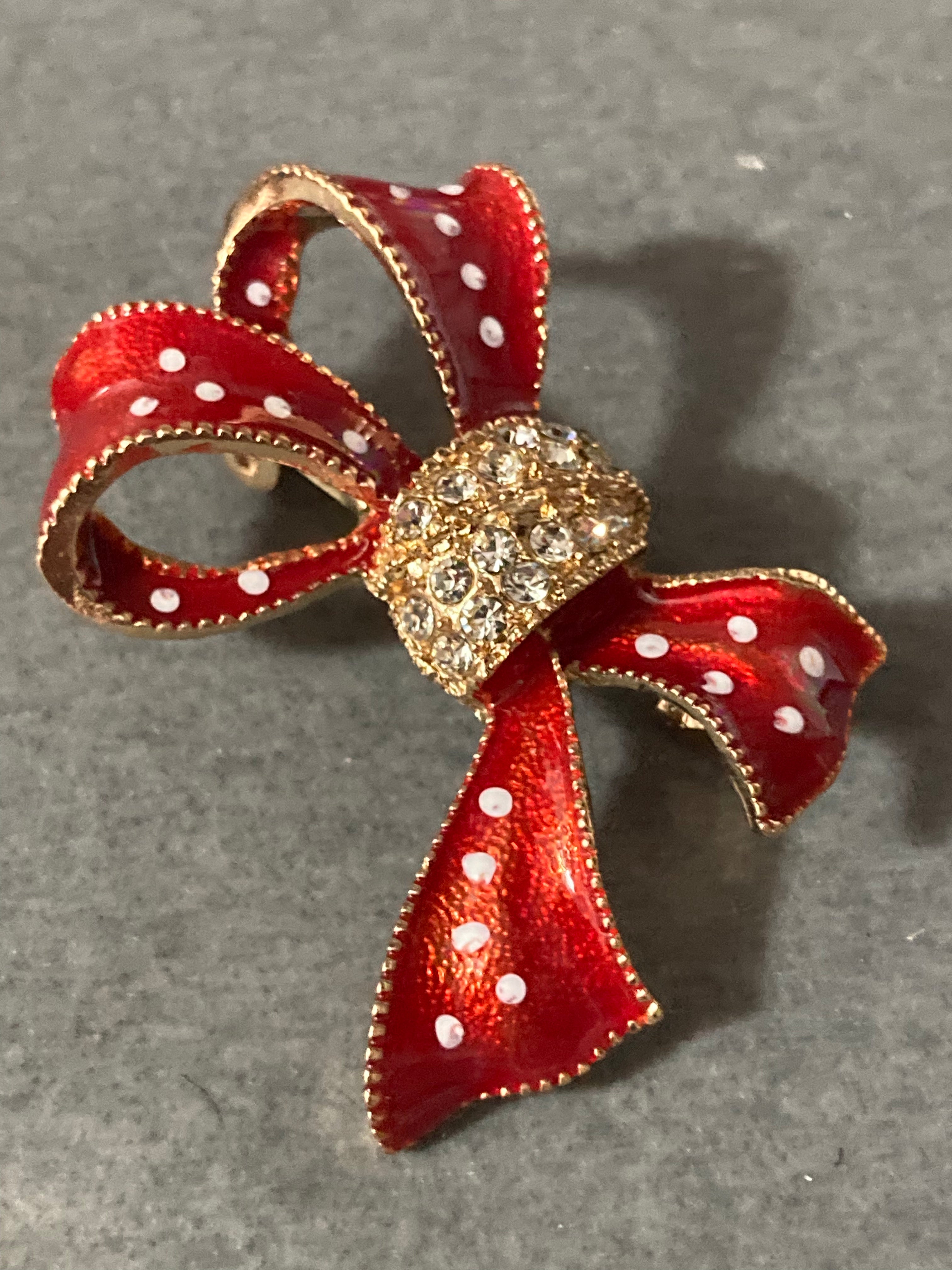 Cure red and white polka dot diamanté bow brooch