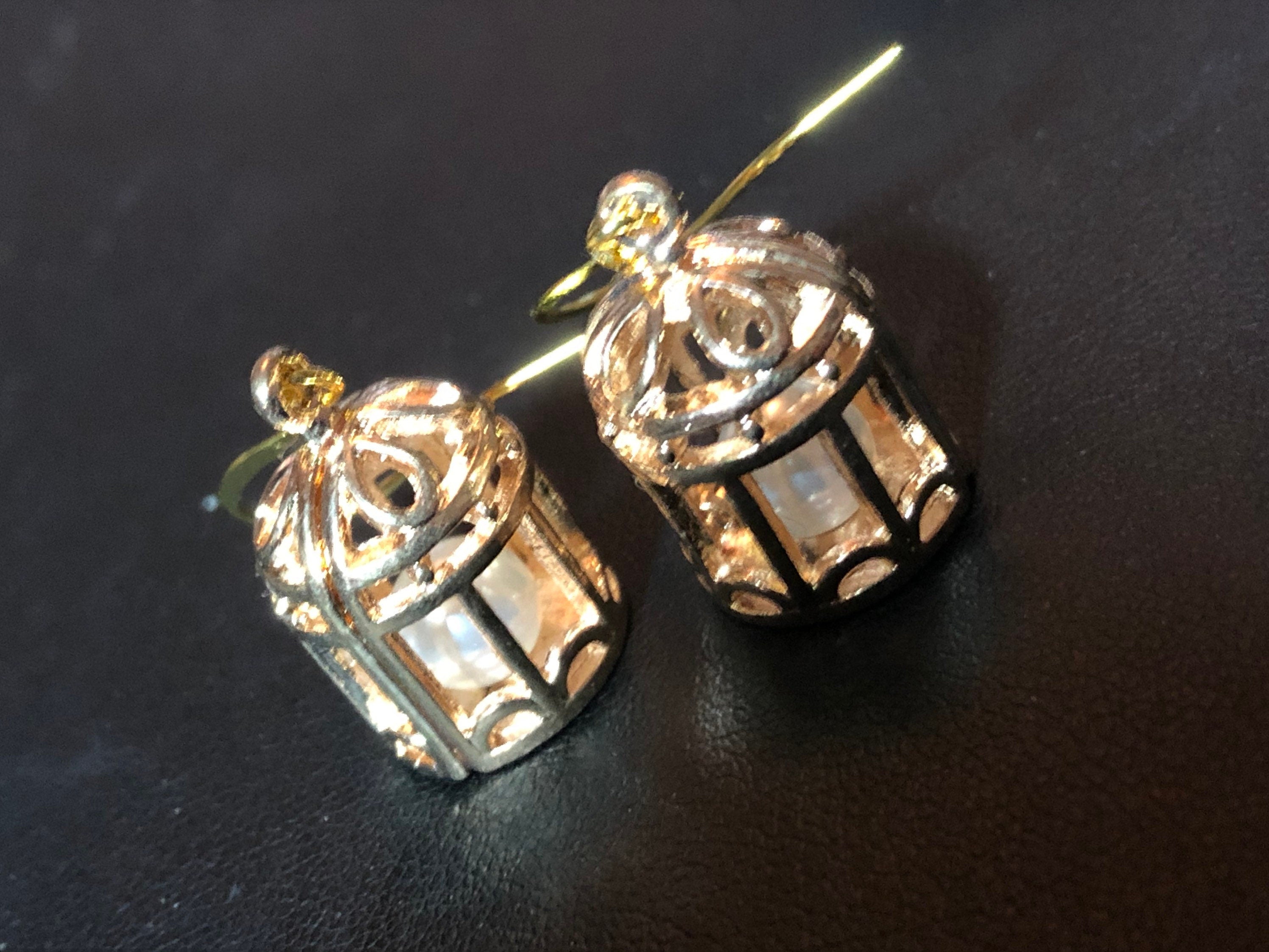 Vintage style gold tone bird cage earrings with inner Pearl pierced ears