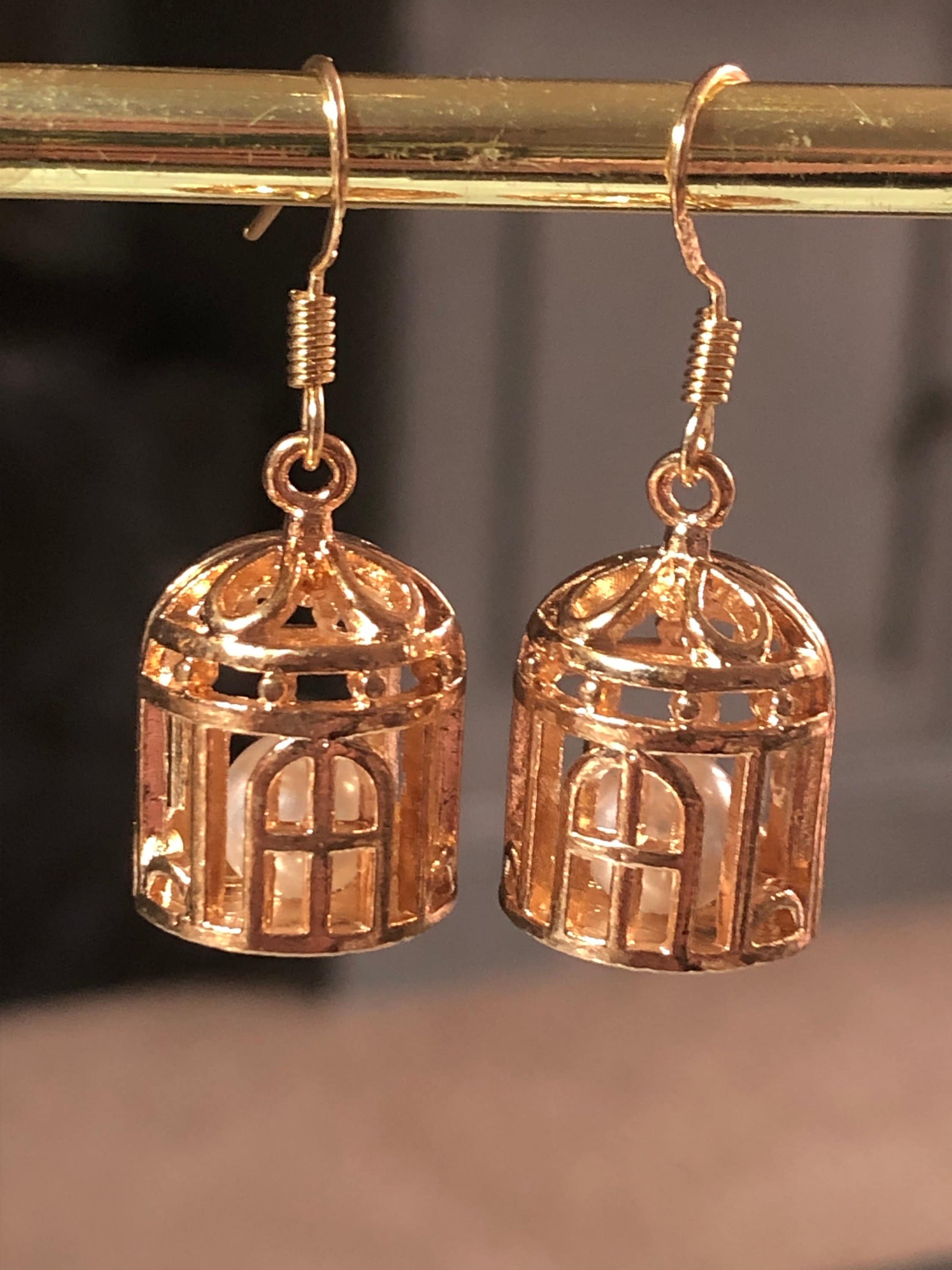 Vintage style gold tone bird cage earrings with inner Pearl pierced ears