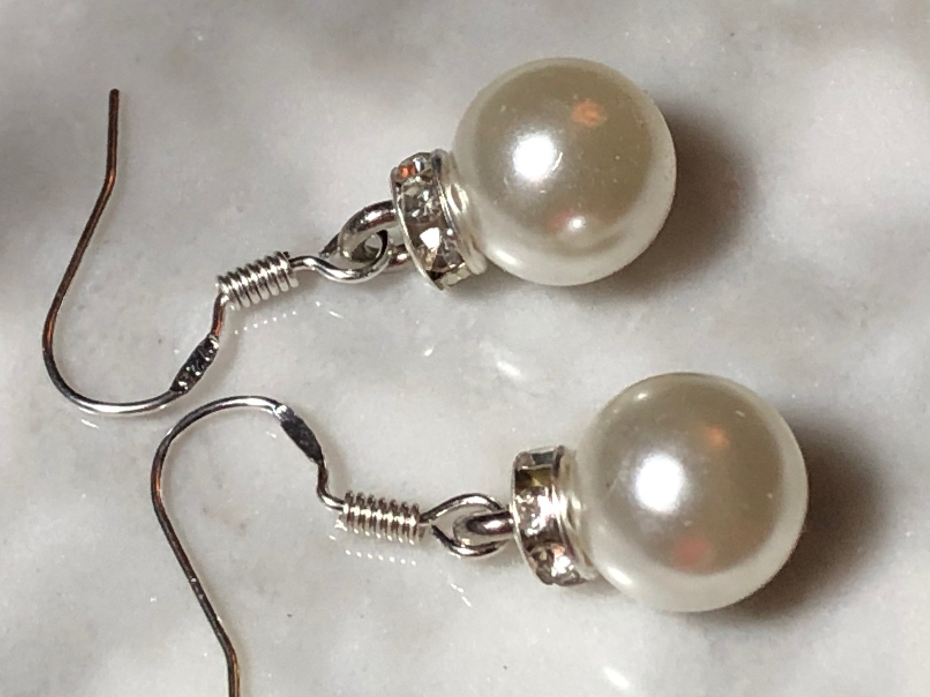 White faux pearl & diamanté silver tone ball earrings