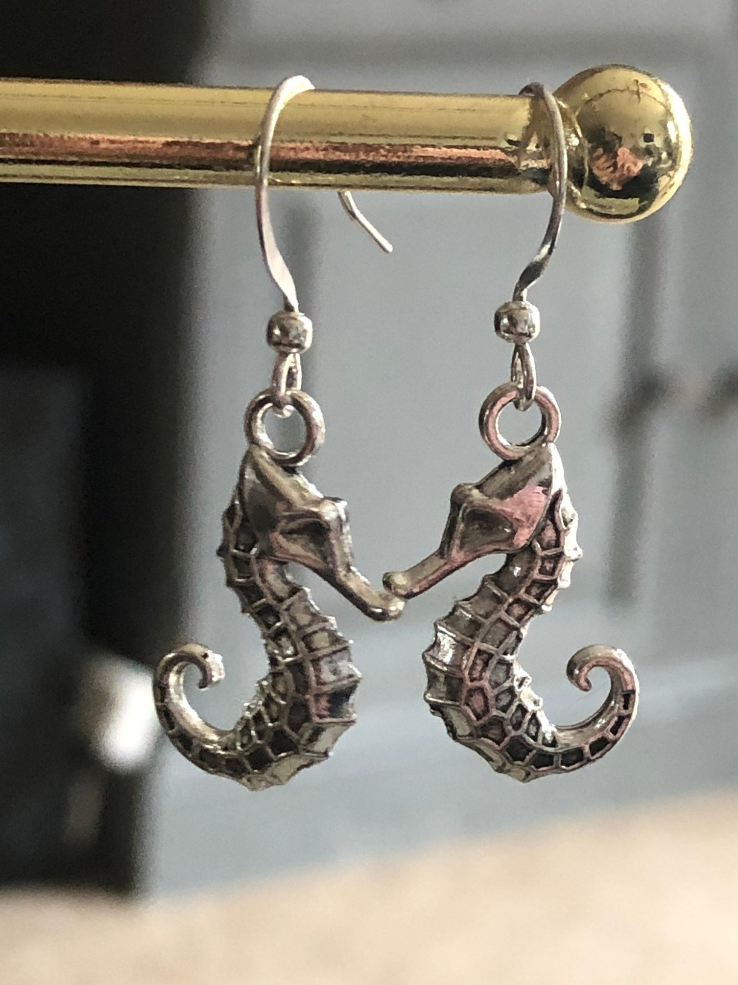 small seahorse drop earrings pierced ears