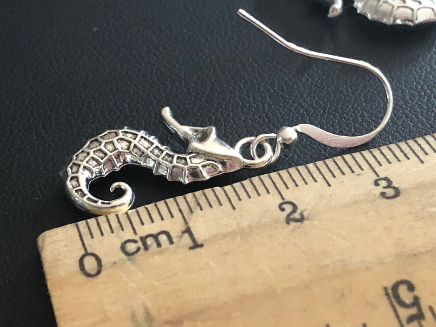 small seahorse drop earrings pierced ears