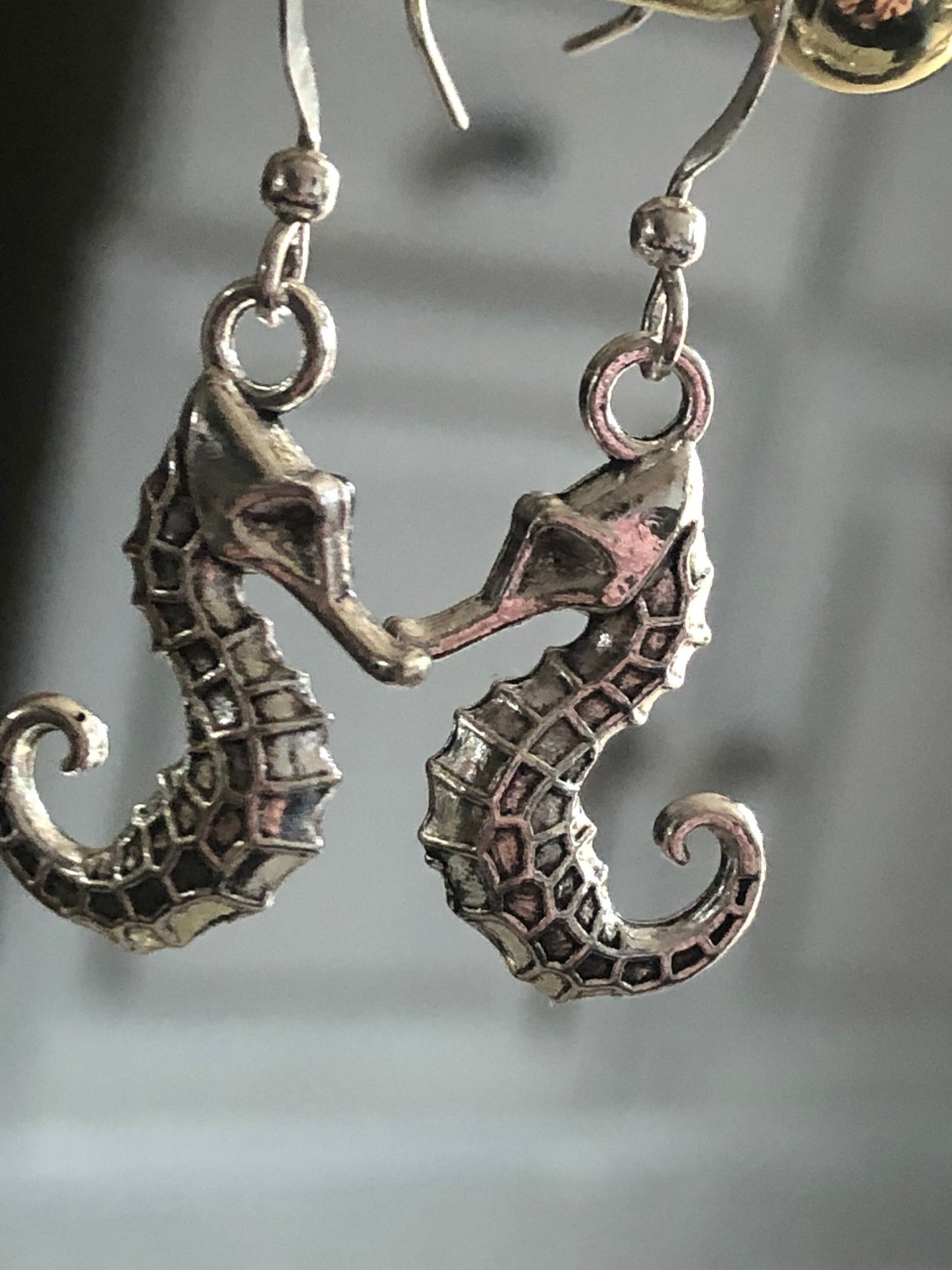 small seahorse drop earrings pierced ears