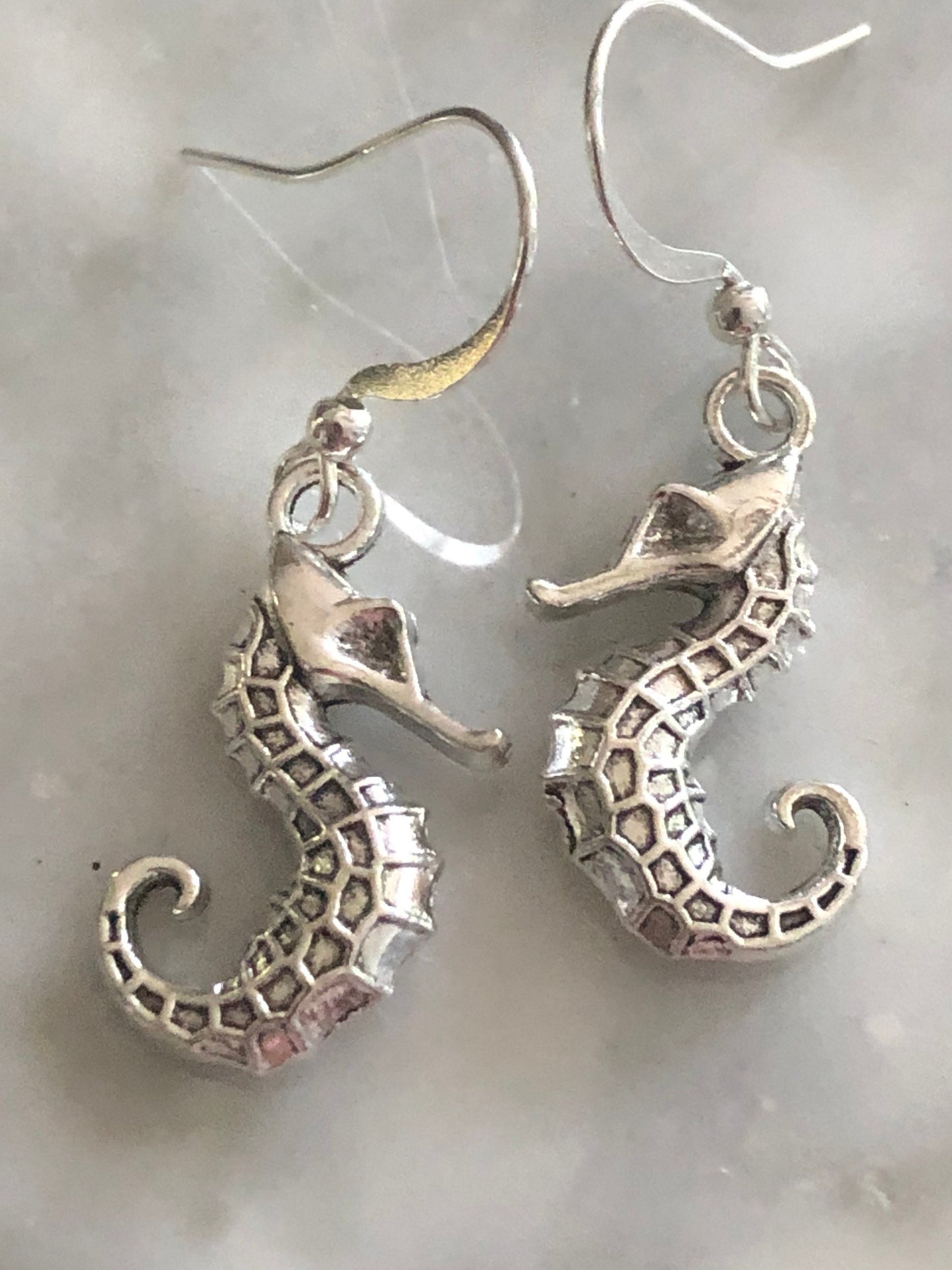 small seahorse drop earrings pierced ears