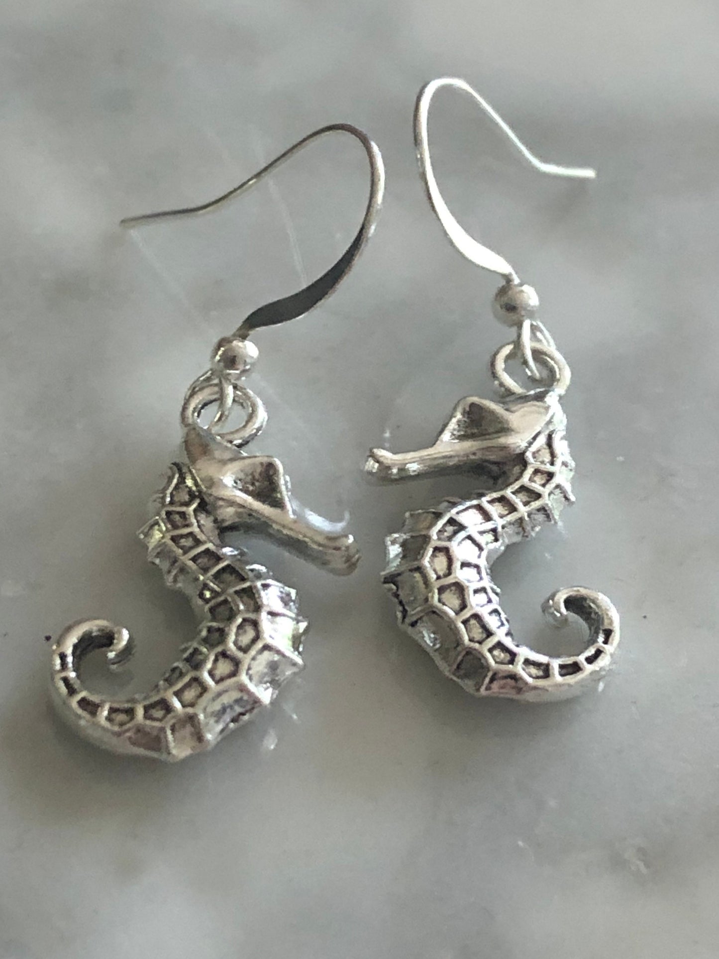 small seahorse drop earrings pierced ears