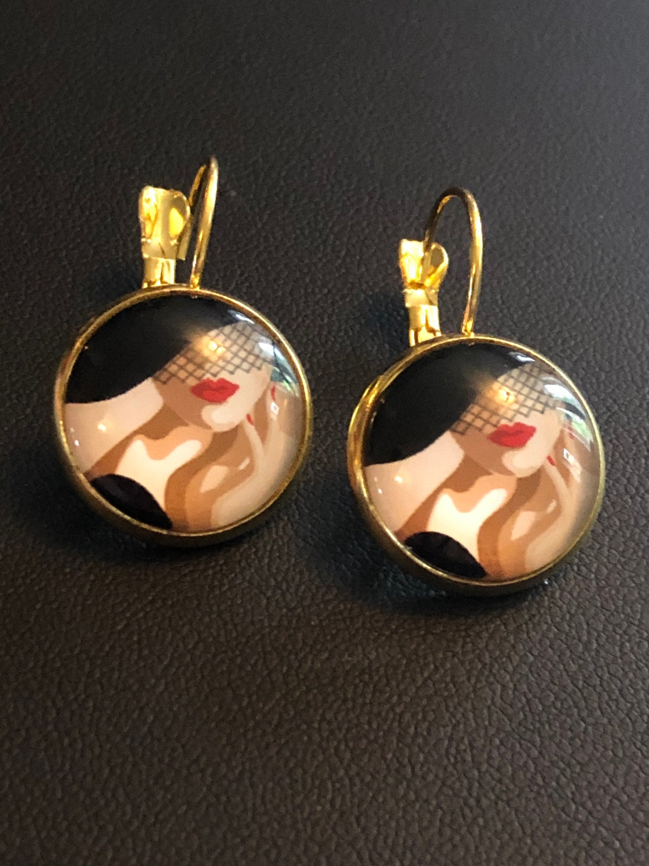 Gold tone Art Deco lady monochrome drop earrings