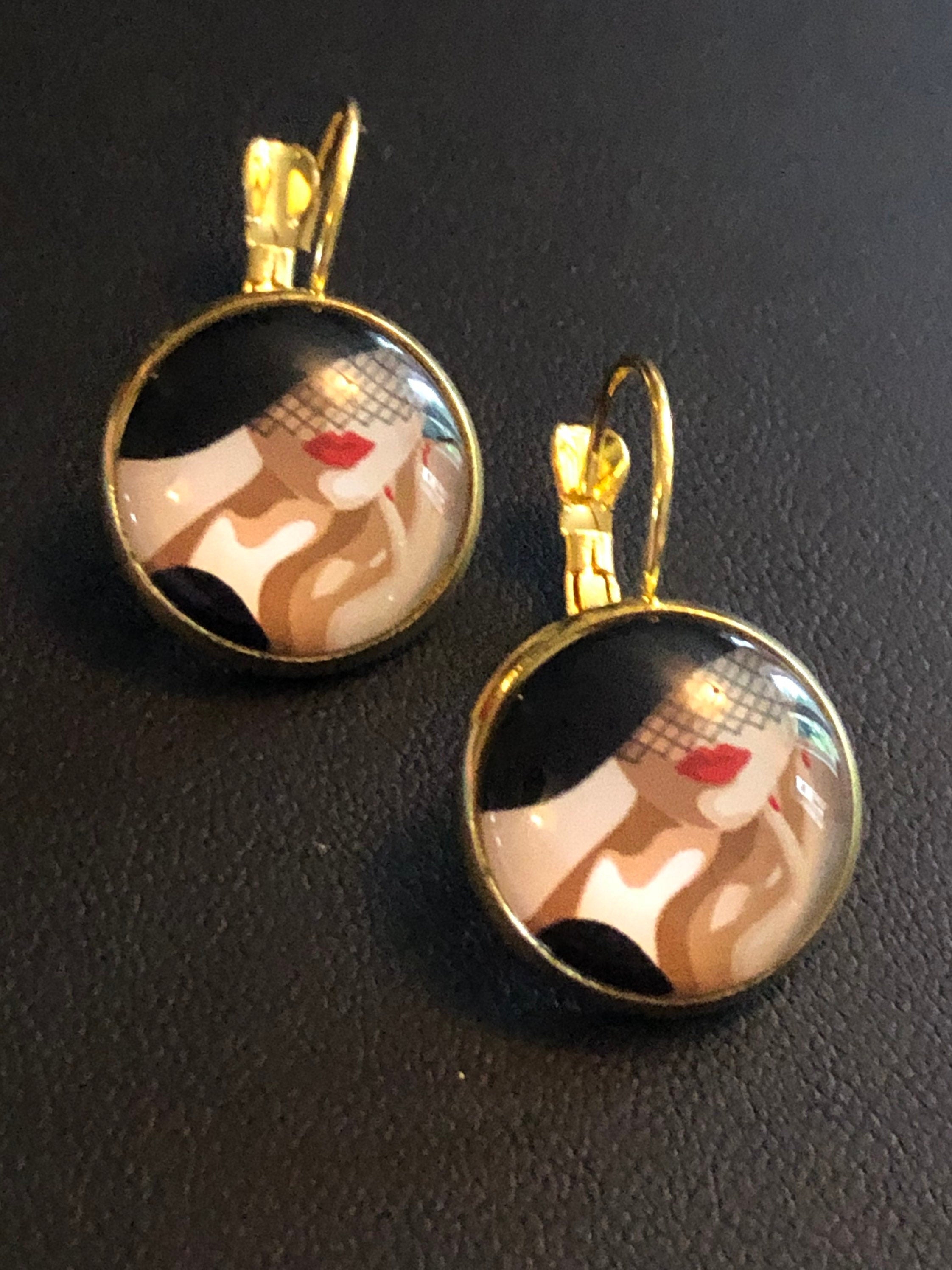 Gold tone Art Deco lady monochrome drop earrings