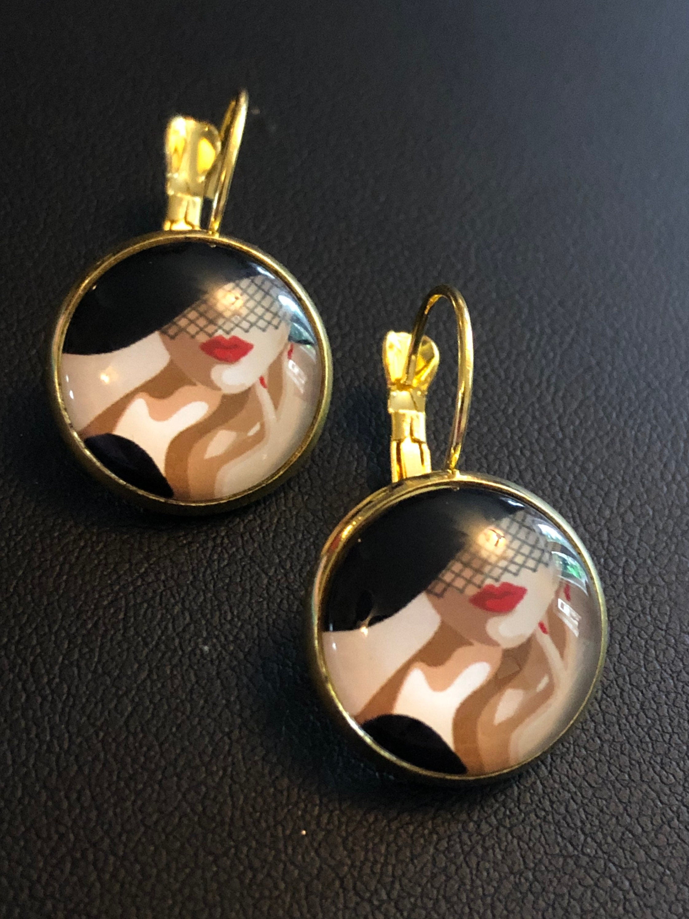 Gold tone Art Deco lady monochrome drop earrings