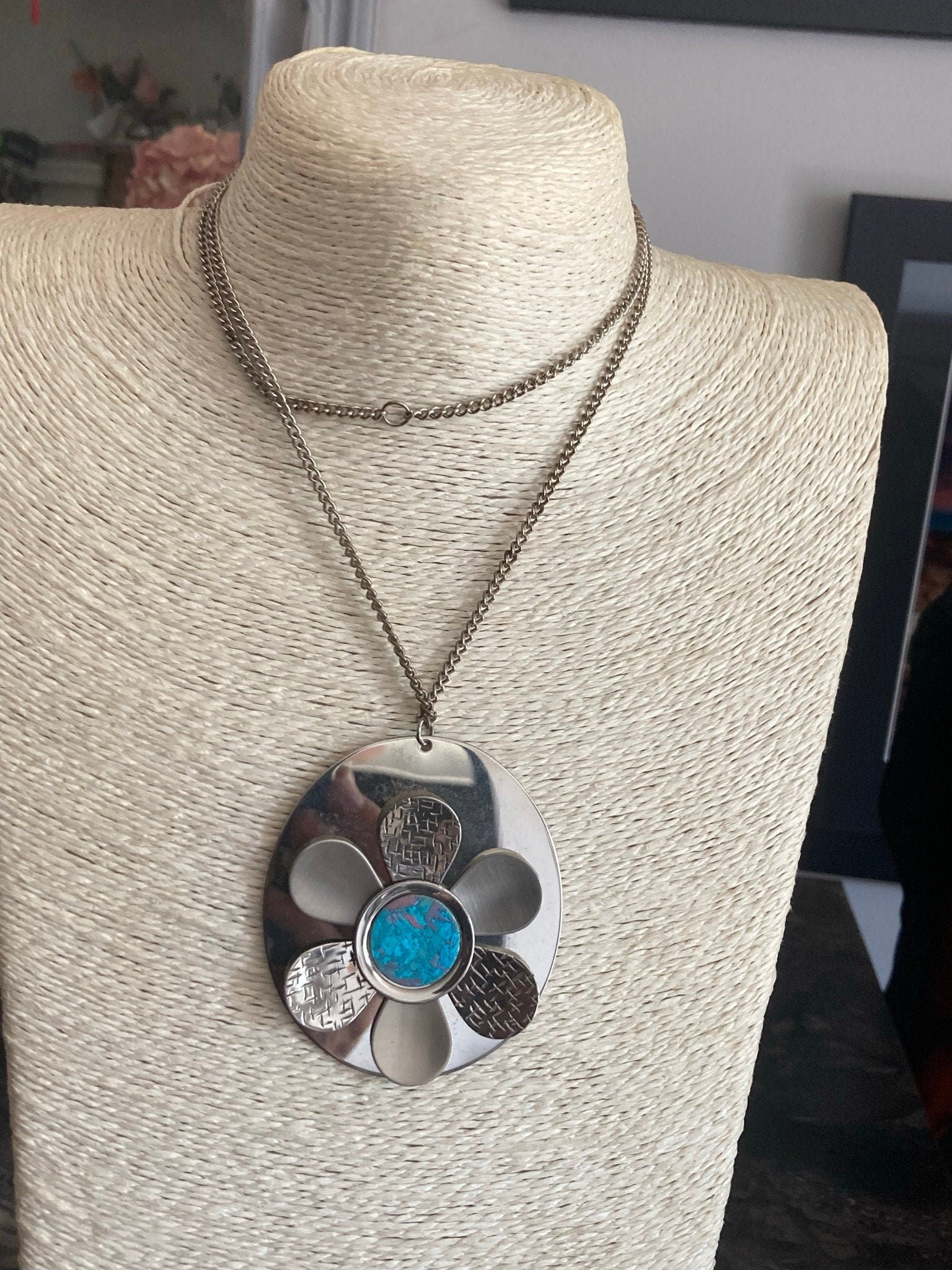 Huge modernist silver tone metal necklace with silver and blue stainless steel floral medallion pendant  BOHO hippie festival necklace