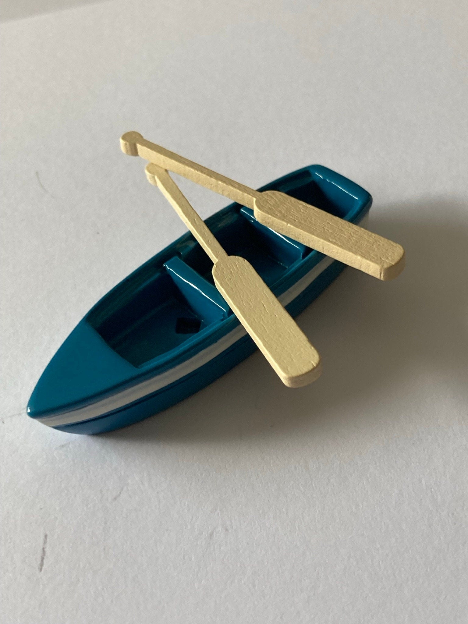 6-7cm miniature blue sea rowing boat and 2 oars seaside cake topper decoration