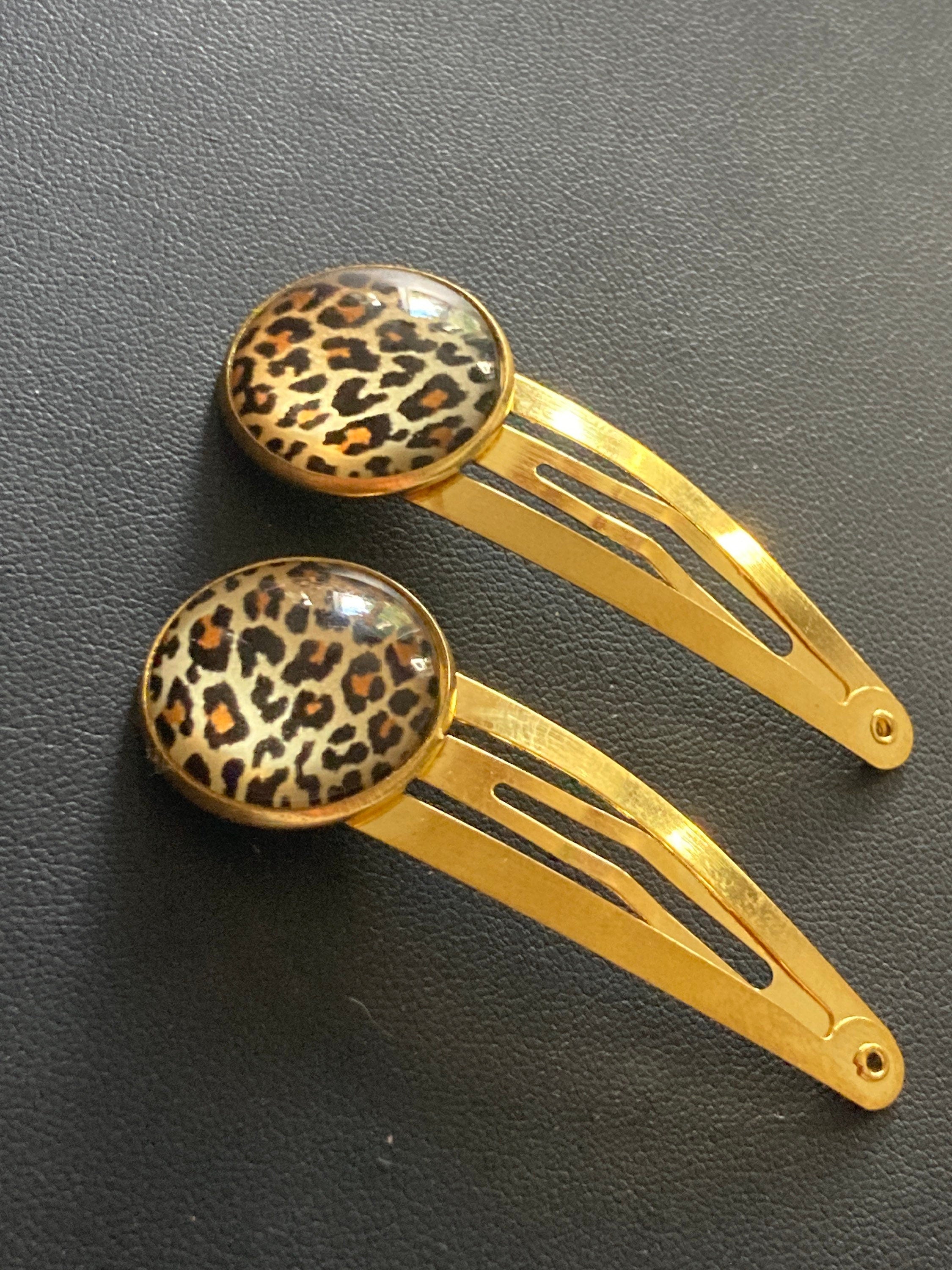 pair of animal leopard print hair clips gold tone snap lock