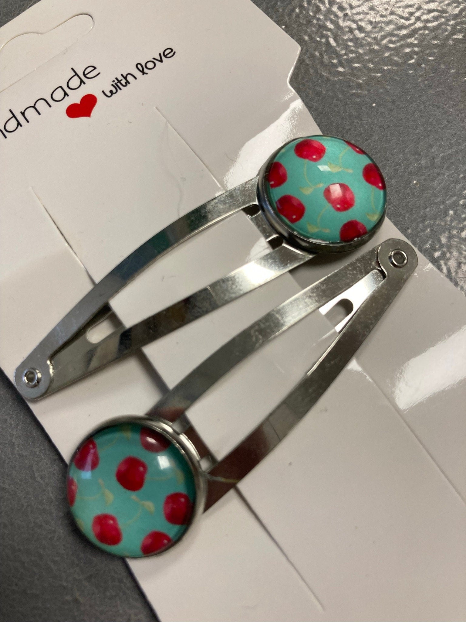 pair of CHERRY hair clips silver tone snap lock