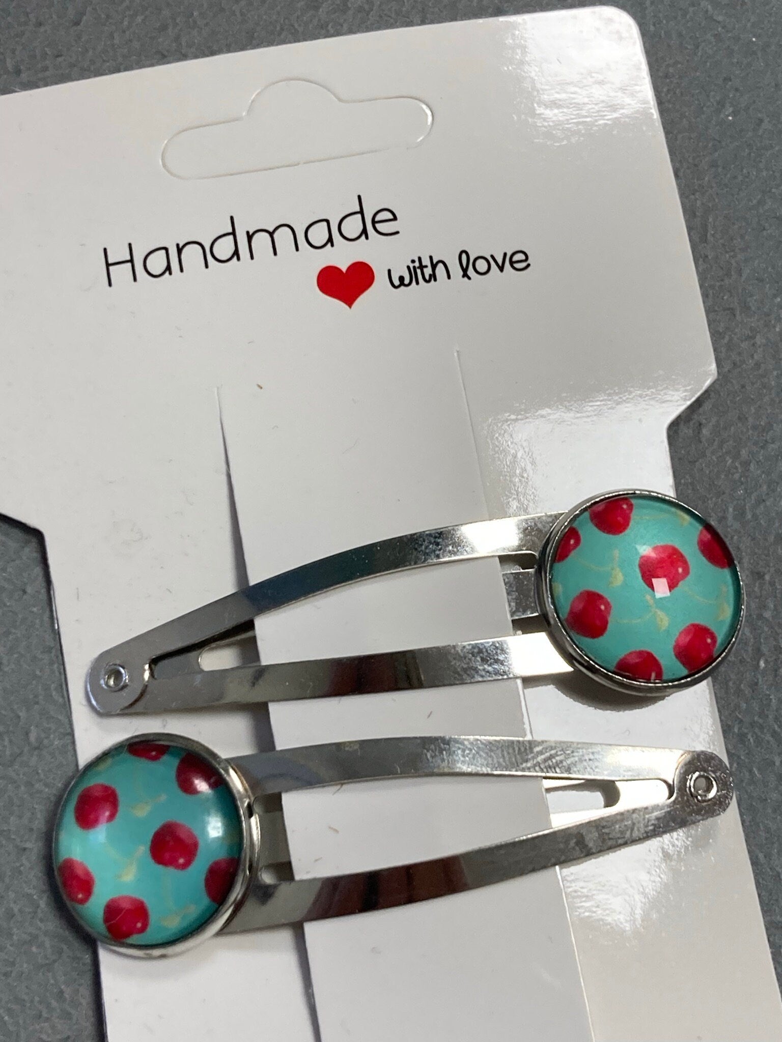 pair of CHERRY hair clips silver tone snap lock