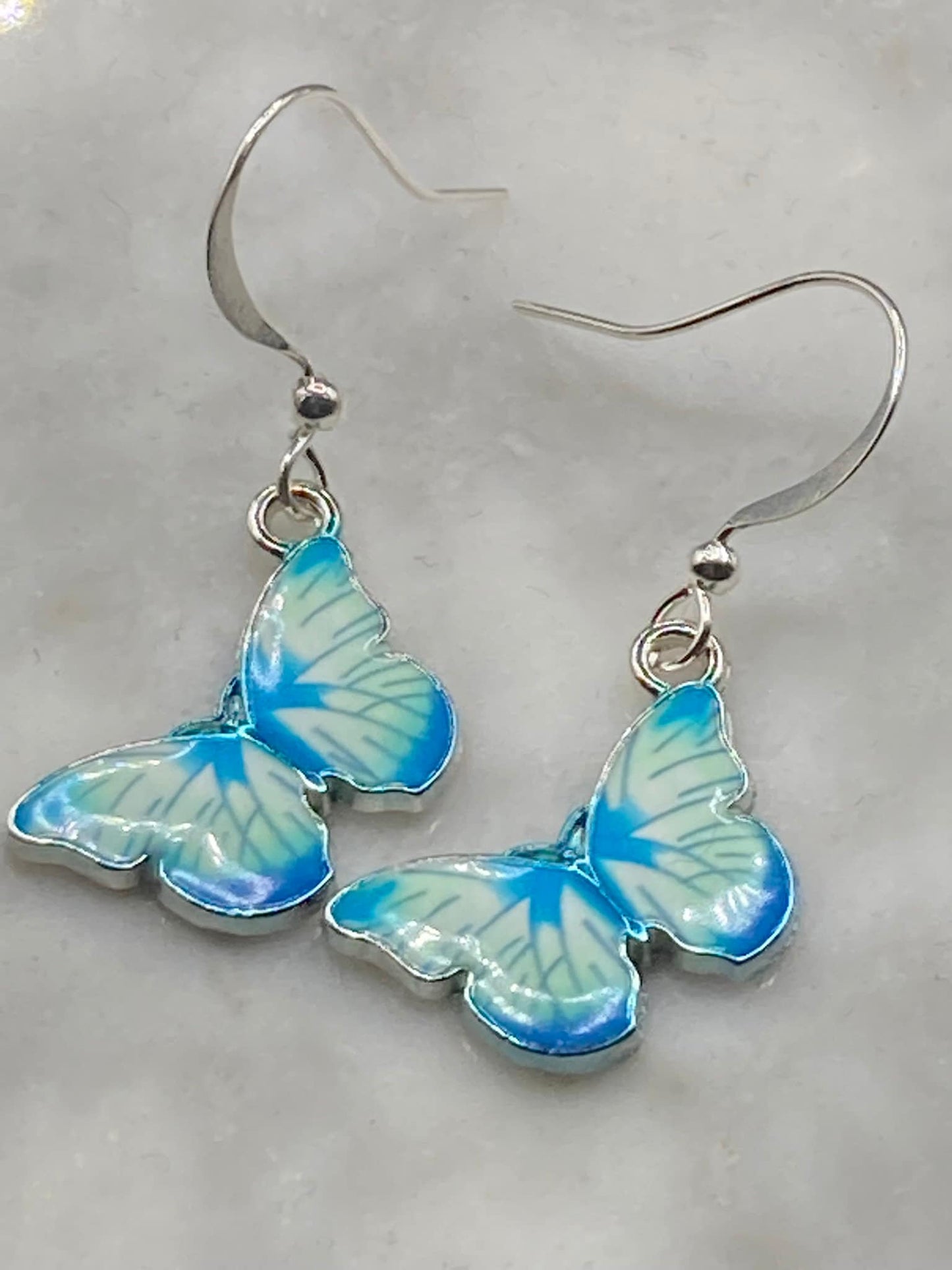 Silver tone blue morpho butterfly earrings