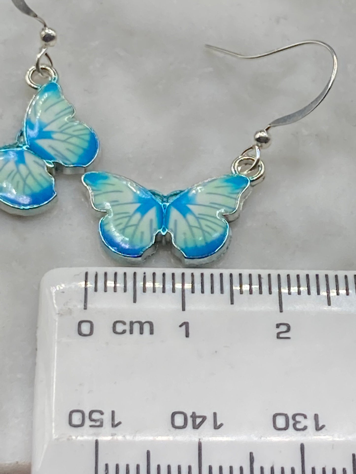 Silver tone blue morpho butterfly earrings