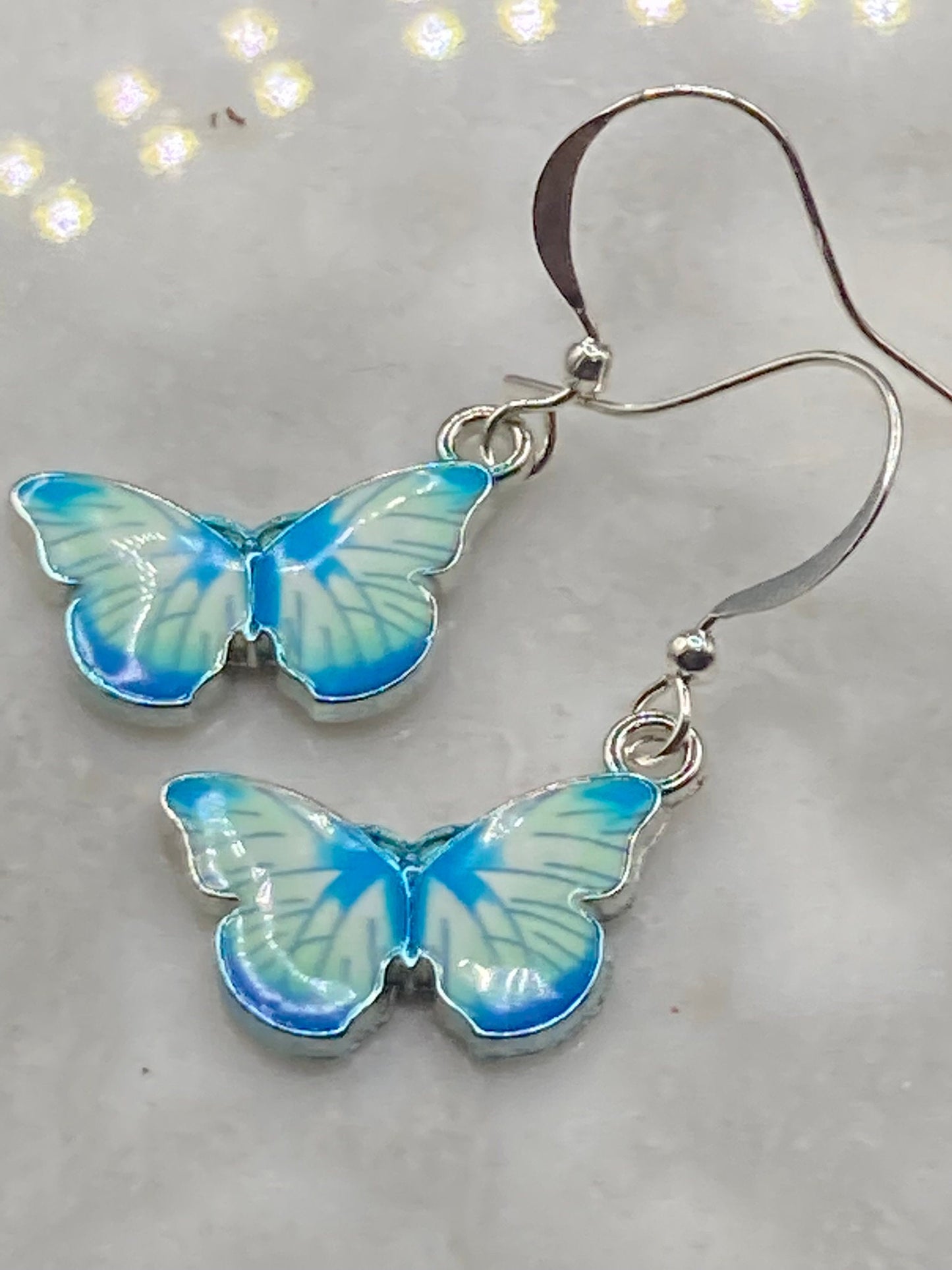 Silver tone blue morpho butterfly earrings