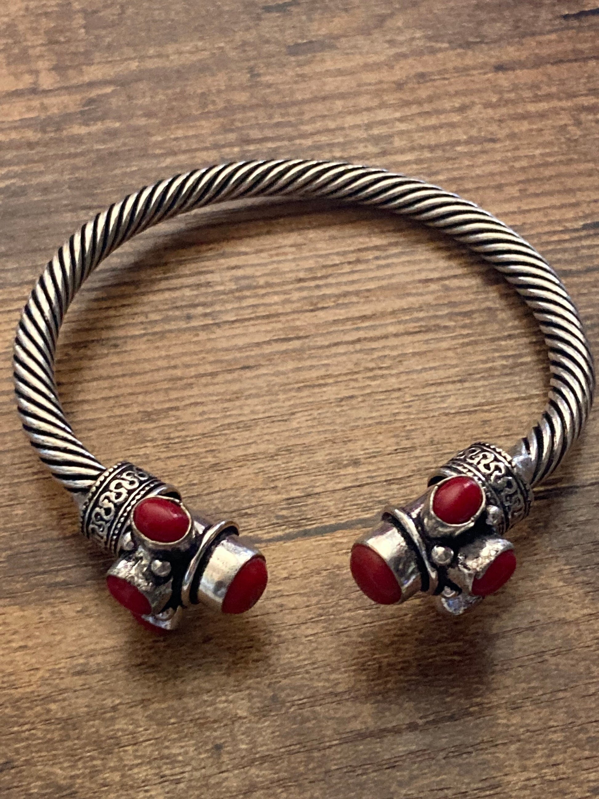 Bright red gemstone silver tone metal torque cuff bangle