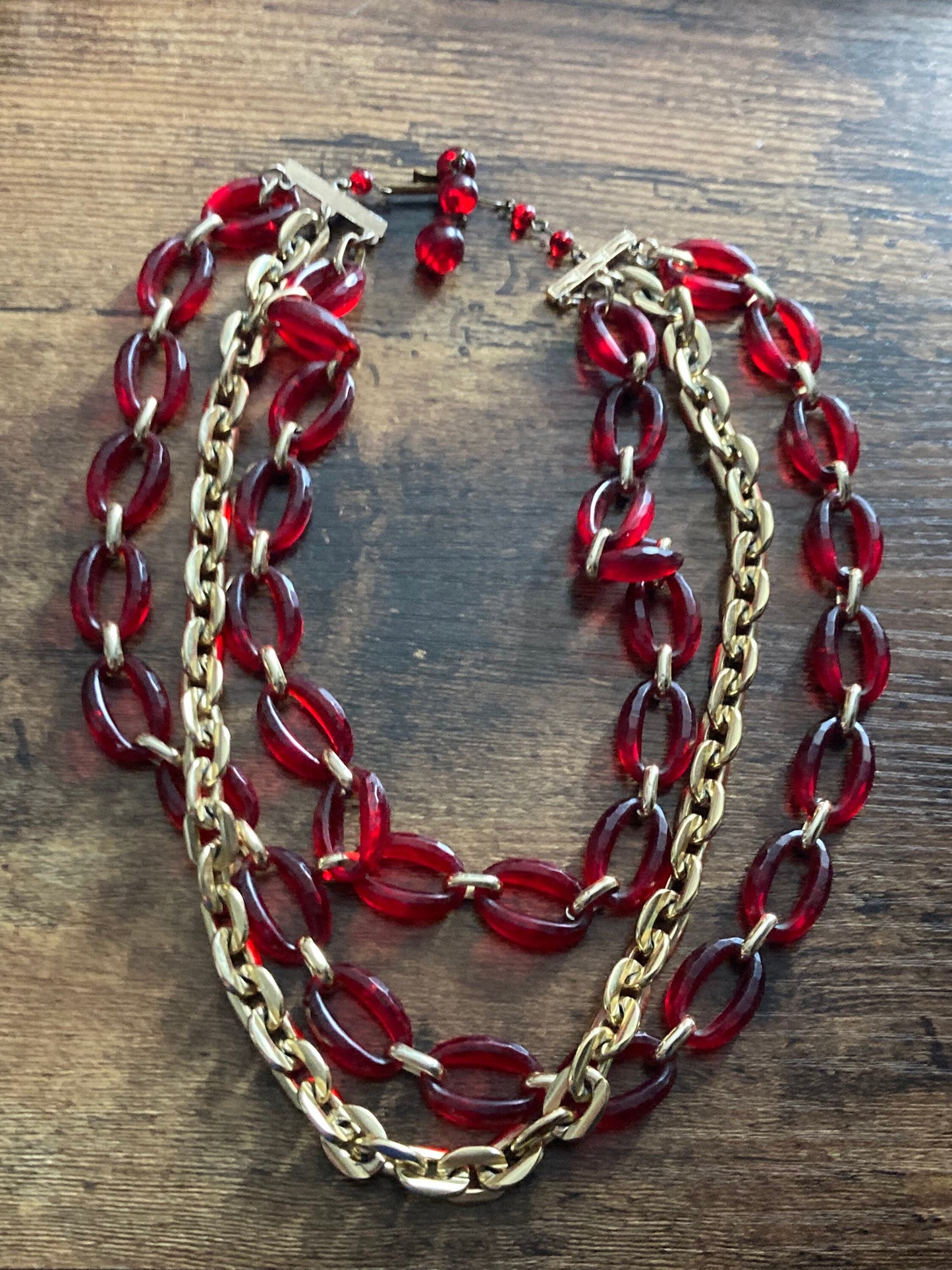Vintage gold tone chain link and red opaque plastic multi strand necklace
