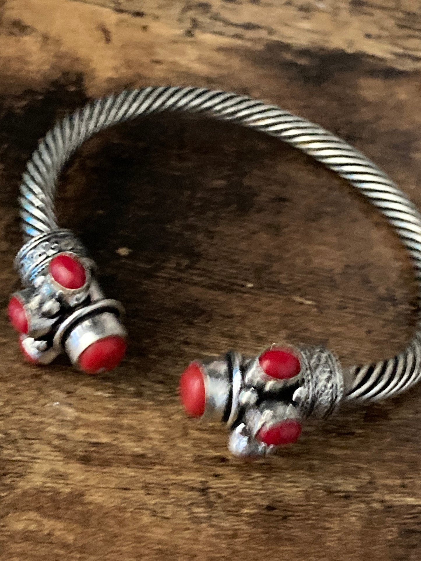 Bright red gemstone silver tone metal torque cuff bangle