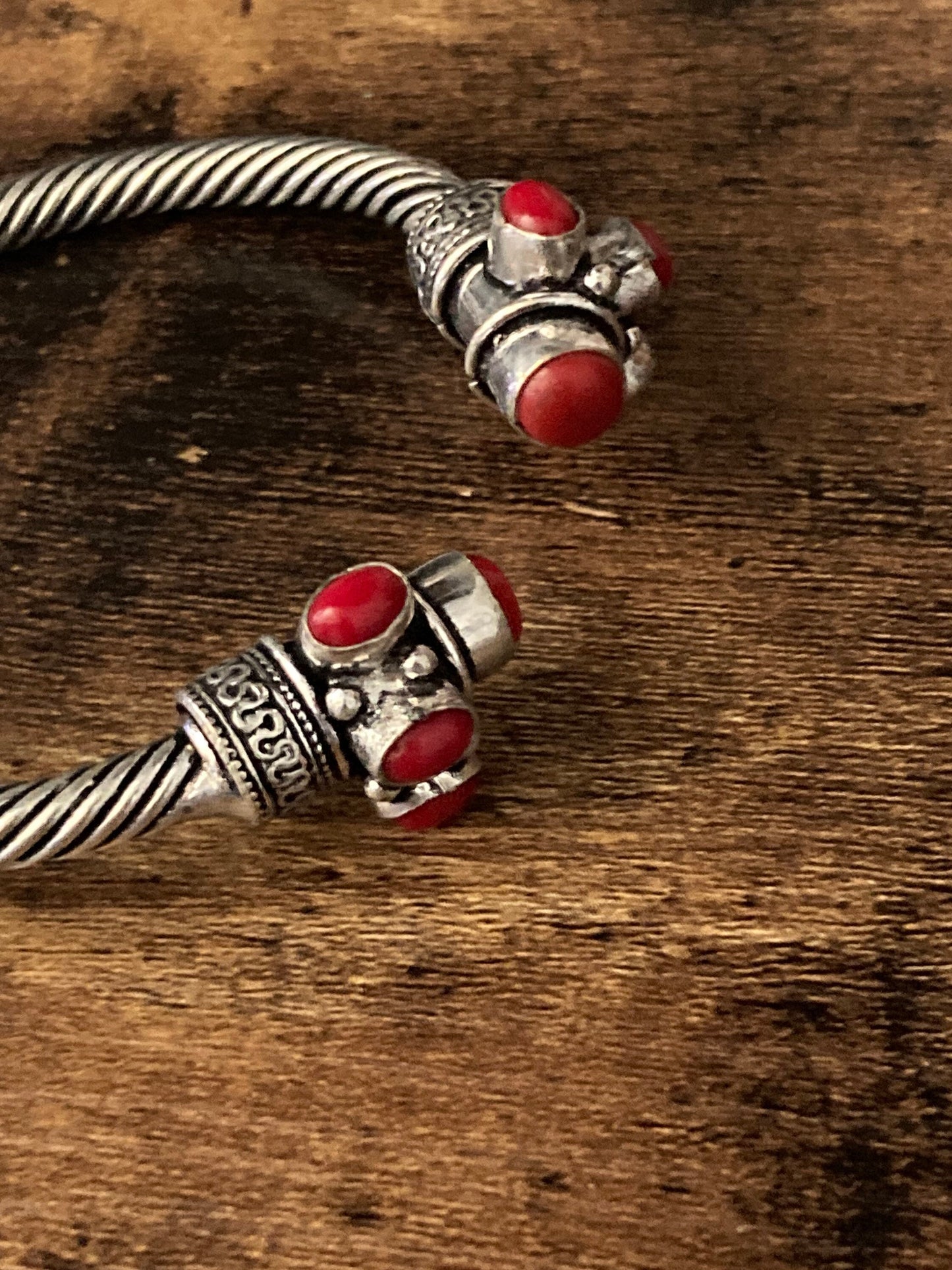 Bright red gemstone silver tone metal torque cuff bangle