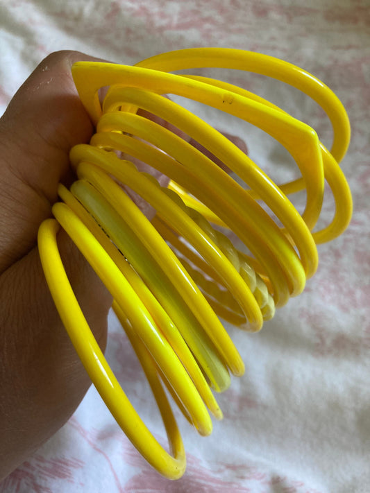 BRIGHT YELLOW stack of vintage retro plastic bangles