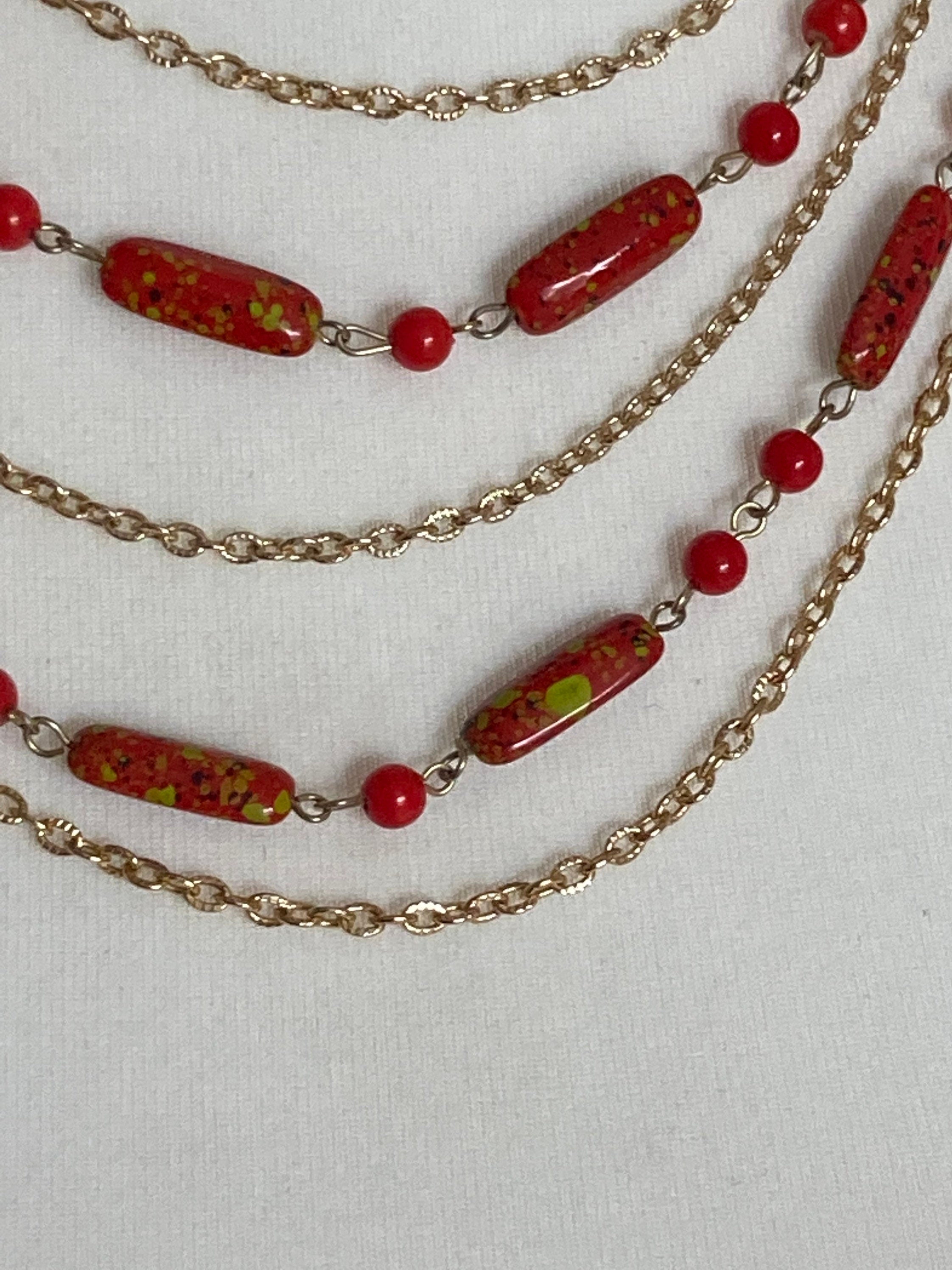 Vintage 1970s gold tone red plastic beaded station link necklace