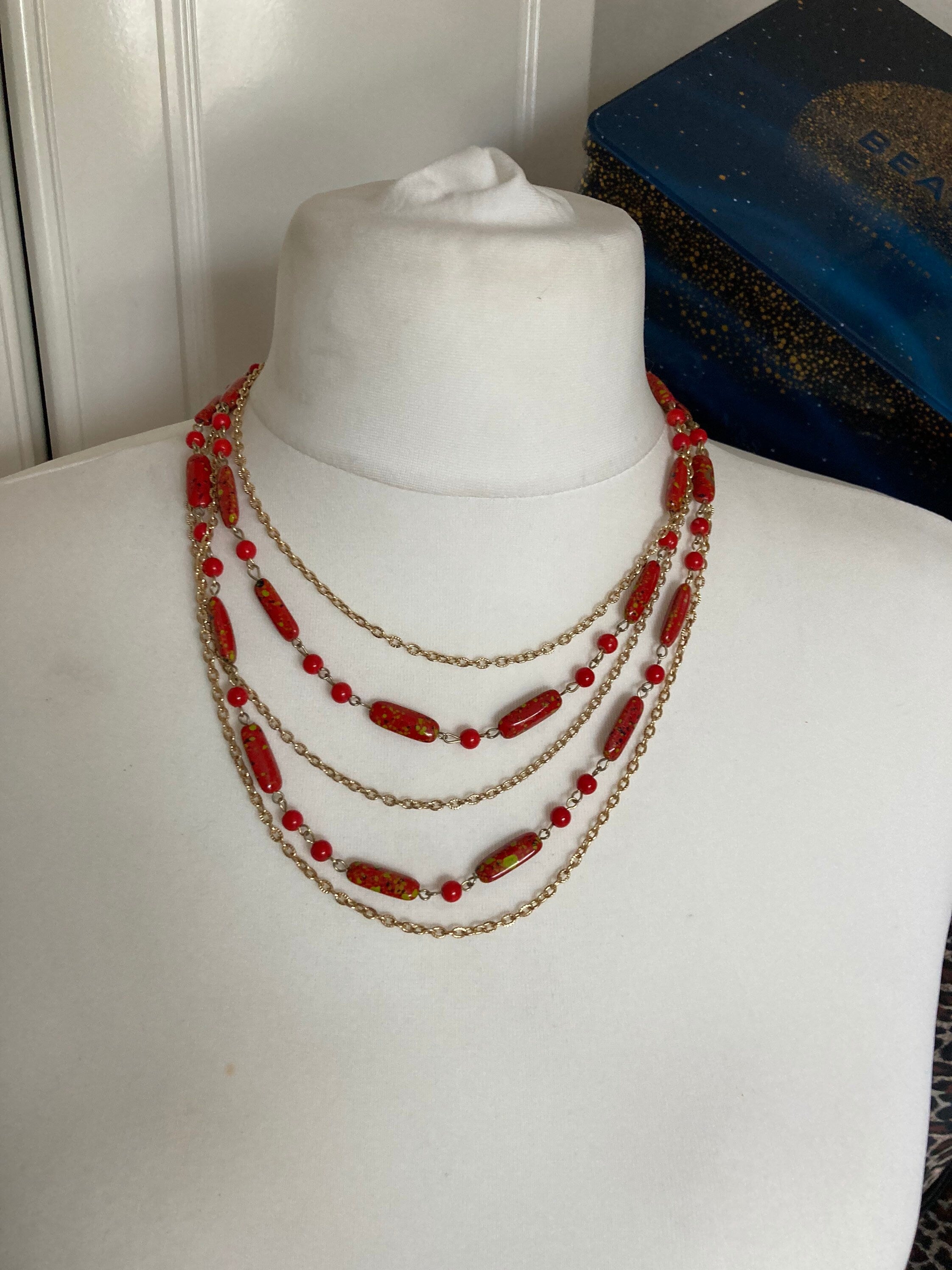 Vintage 1970s gold tone red plastic beaded station link necklace