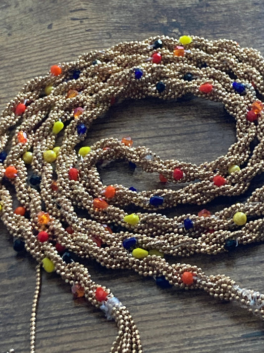 140cm long gold tone multi-strand seed bead flapper length sartour or tassel necklace