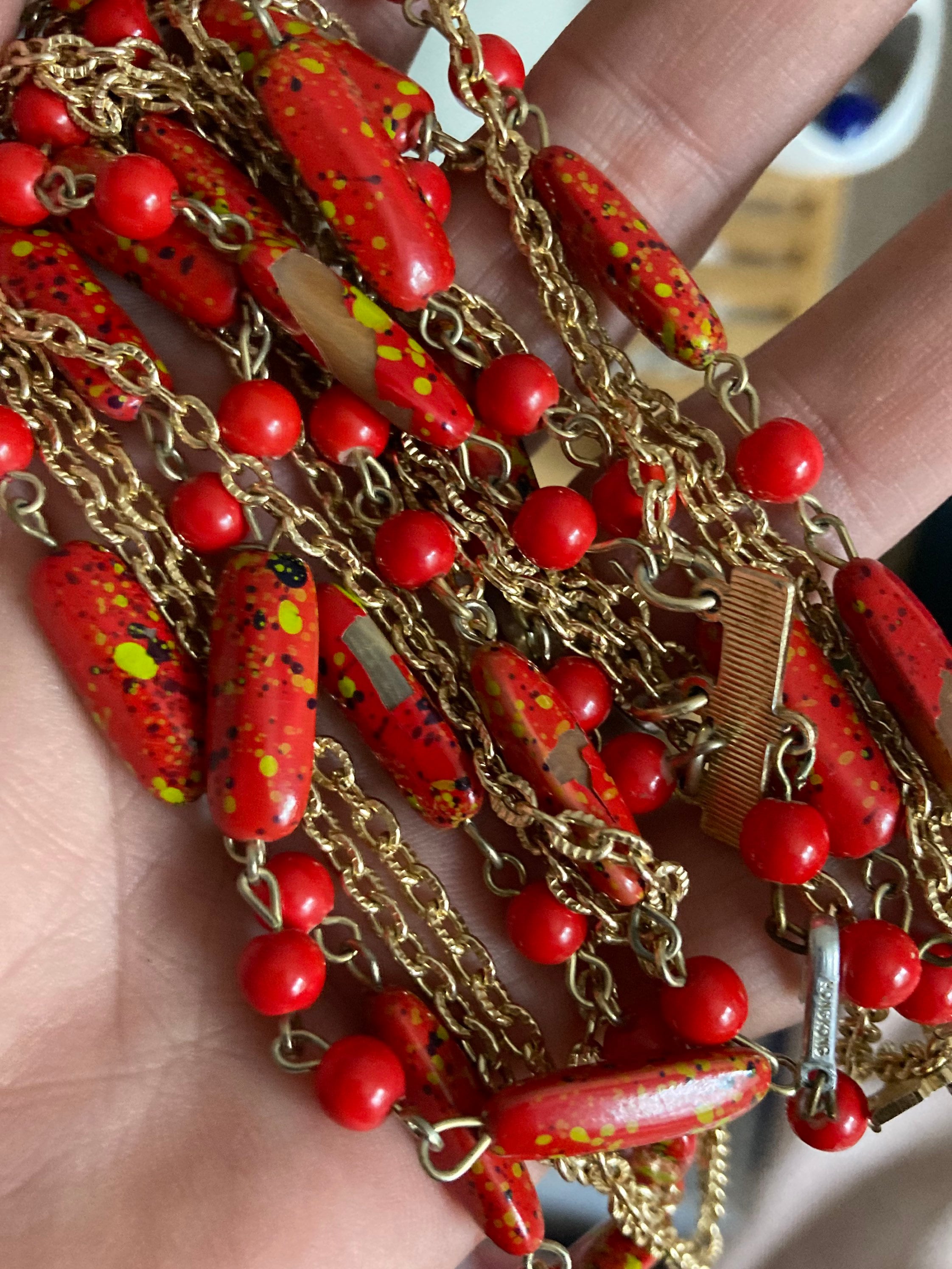 Vintage 1970s gold tone red plastic beaded station link necklace