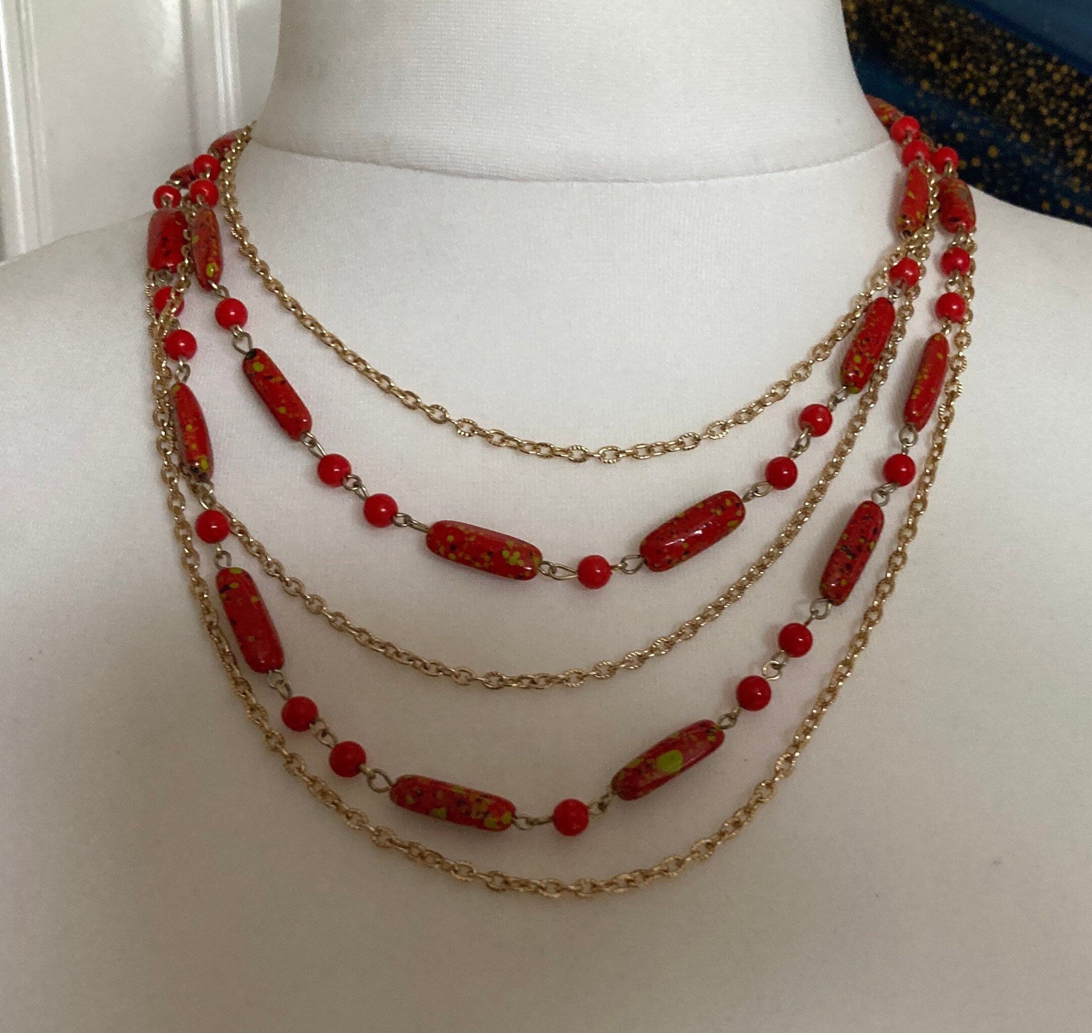 Vintage 1970s gold tone red plastic beaded station link necklace