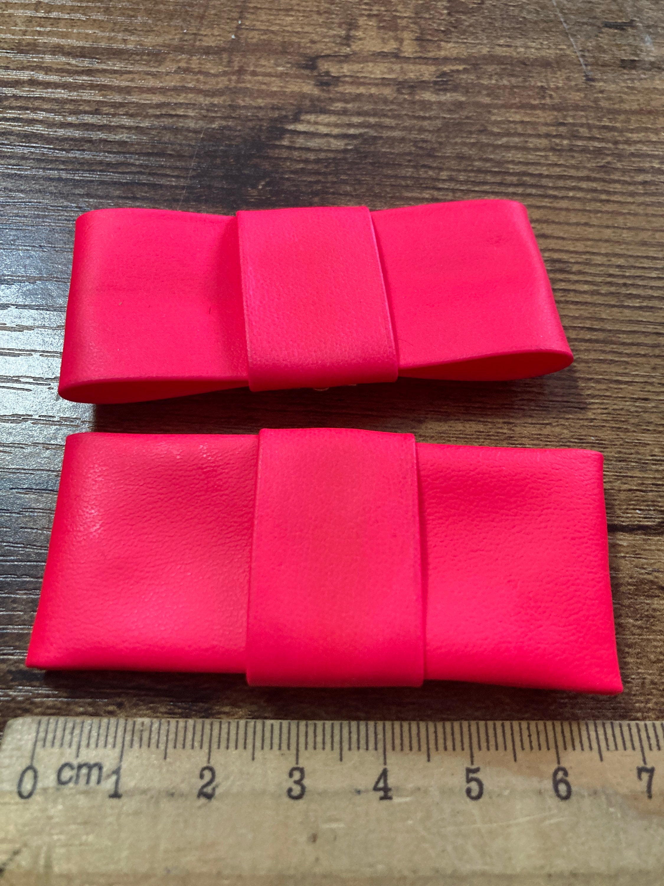 pair of Luminous pink dayglo tone FAUX leather bow shoe clips Vintage retro