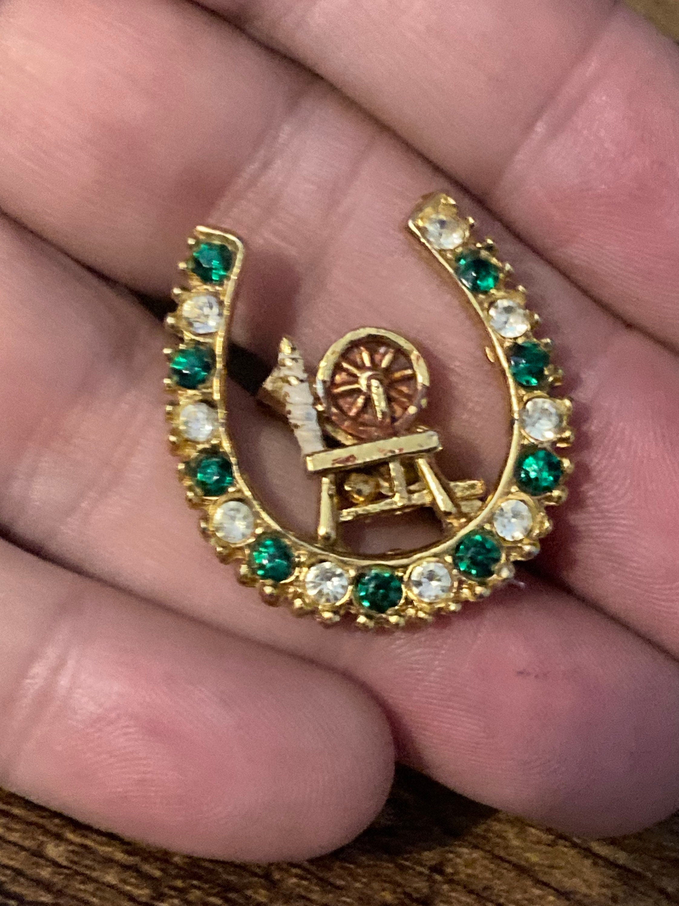 spinning wheel Vintage lucky horseshoe clear green diamanté gold brooch